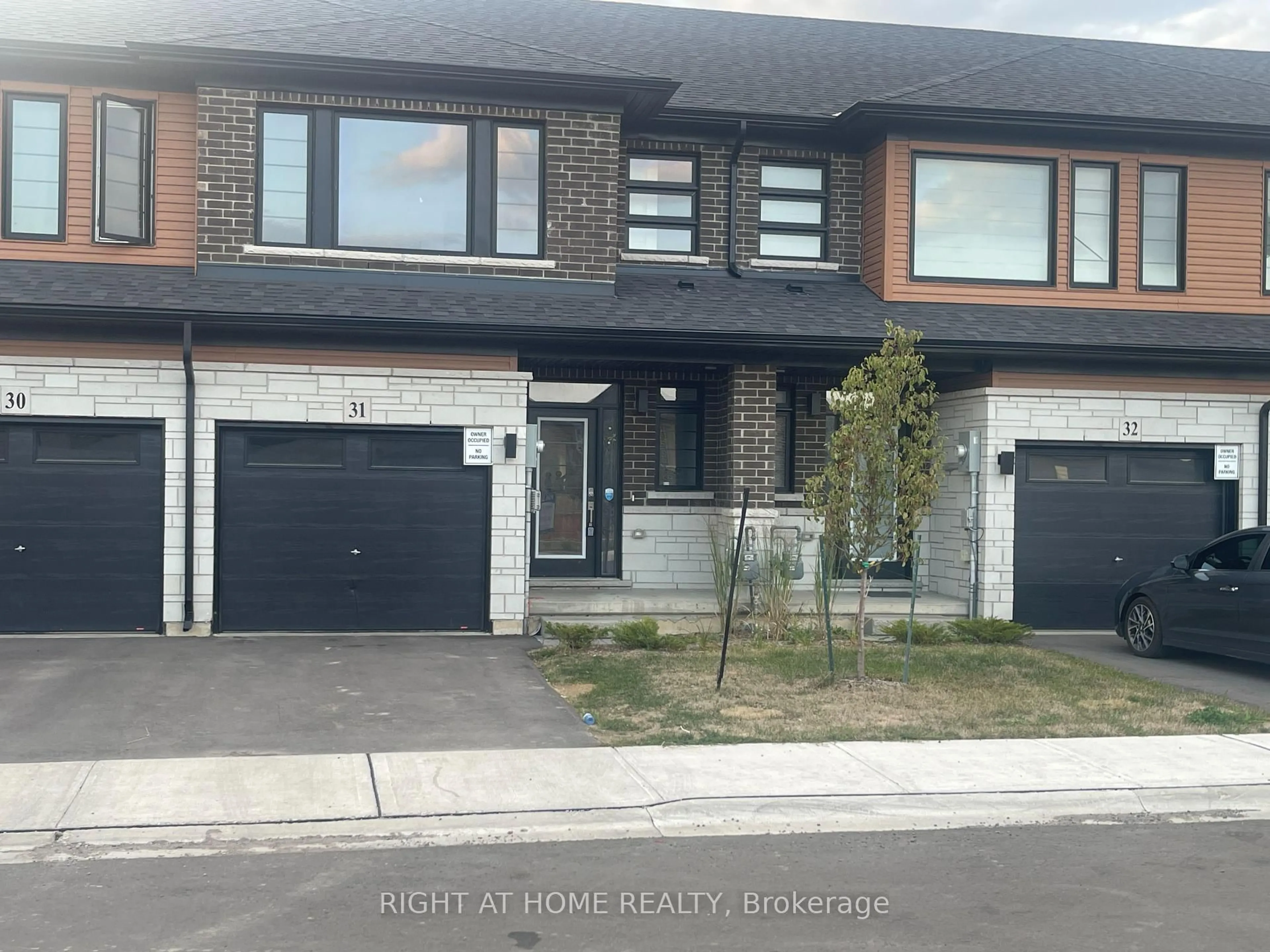 Home with brick exterior material, street for 448 Blackburn Dr #31, Brantford Ontario N3T 0X2
