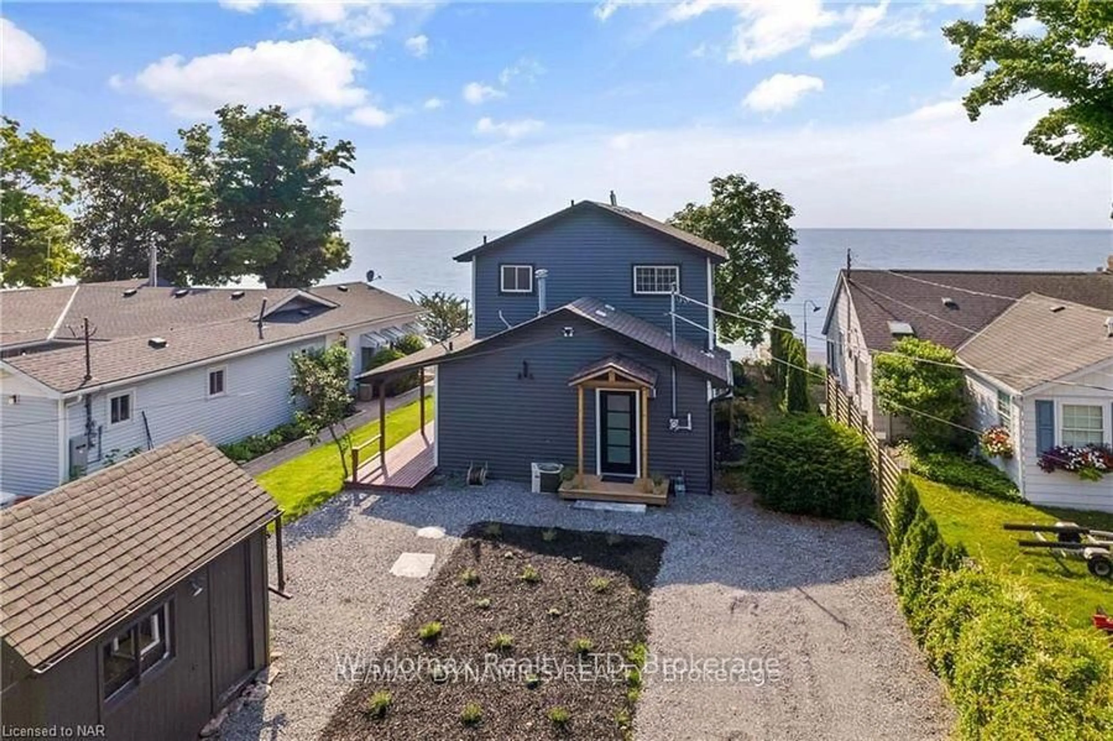 A pic from outside/outdoor area/front of a property/back of a property/a pic from drone, water/lake/river/ocean view for 11371 NEFF St, Wainfleet Ontario L0S 1V0