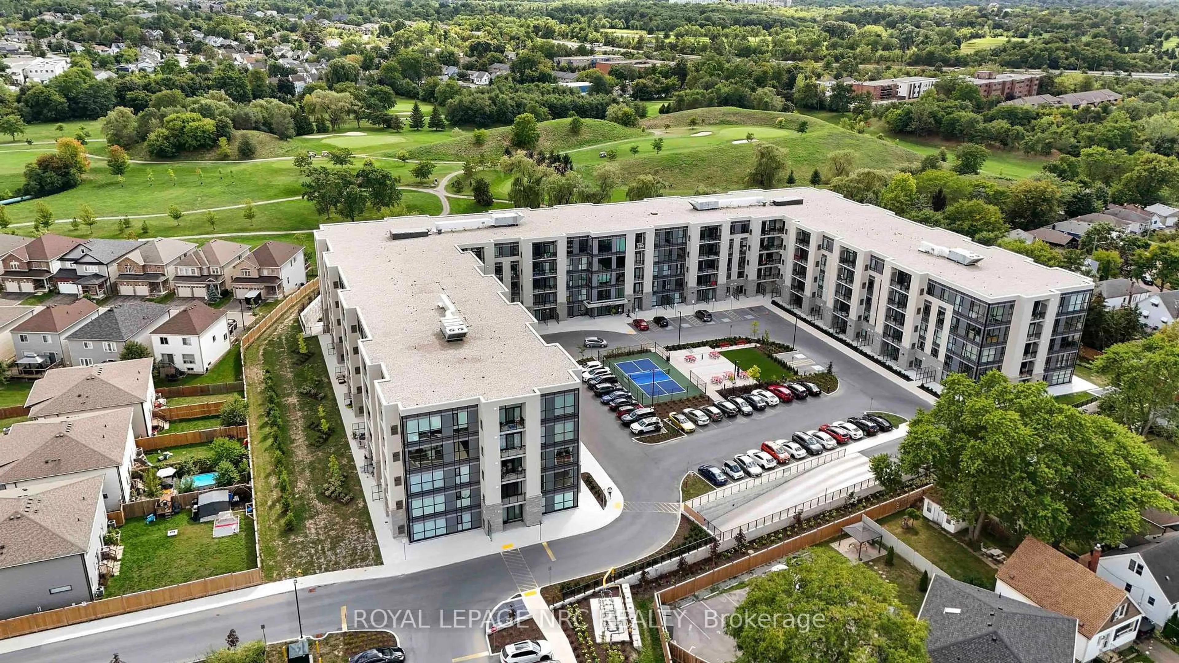 A pic from outside/outdoor area/front of a property/back of a property/a pic from drone, city buildings view from balcony for 50 Herrick Ave #LP-45, St. Catharines Ontario L2P 0G3