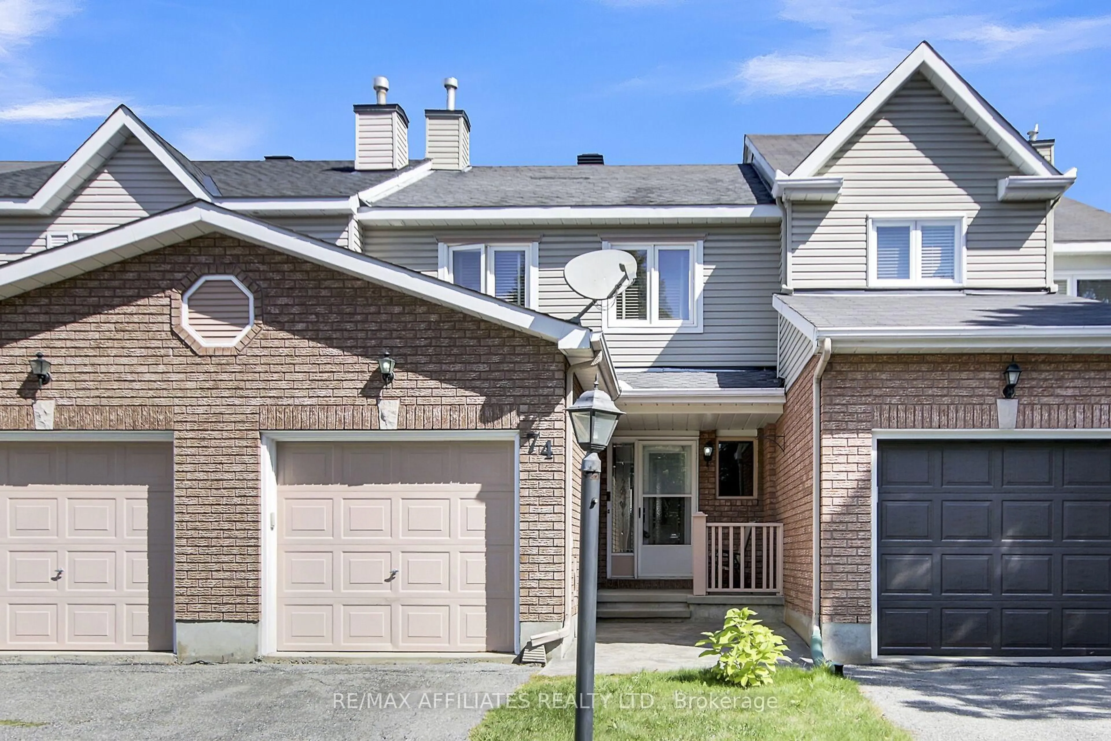 Home with brick exterior material, street for 74 Markland Cres, Ottawa Ontario K2G 5Z6
