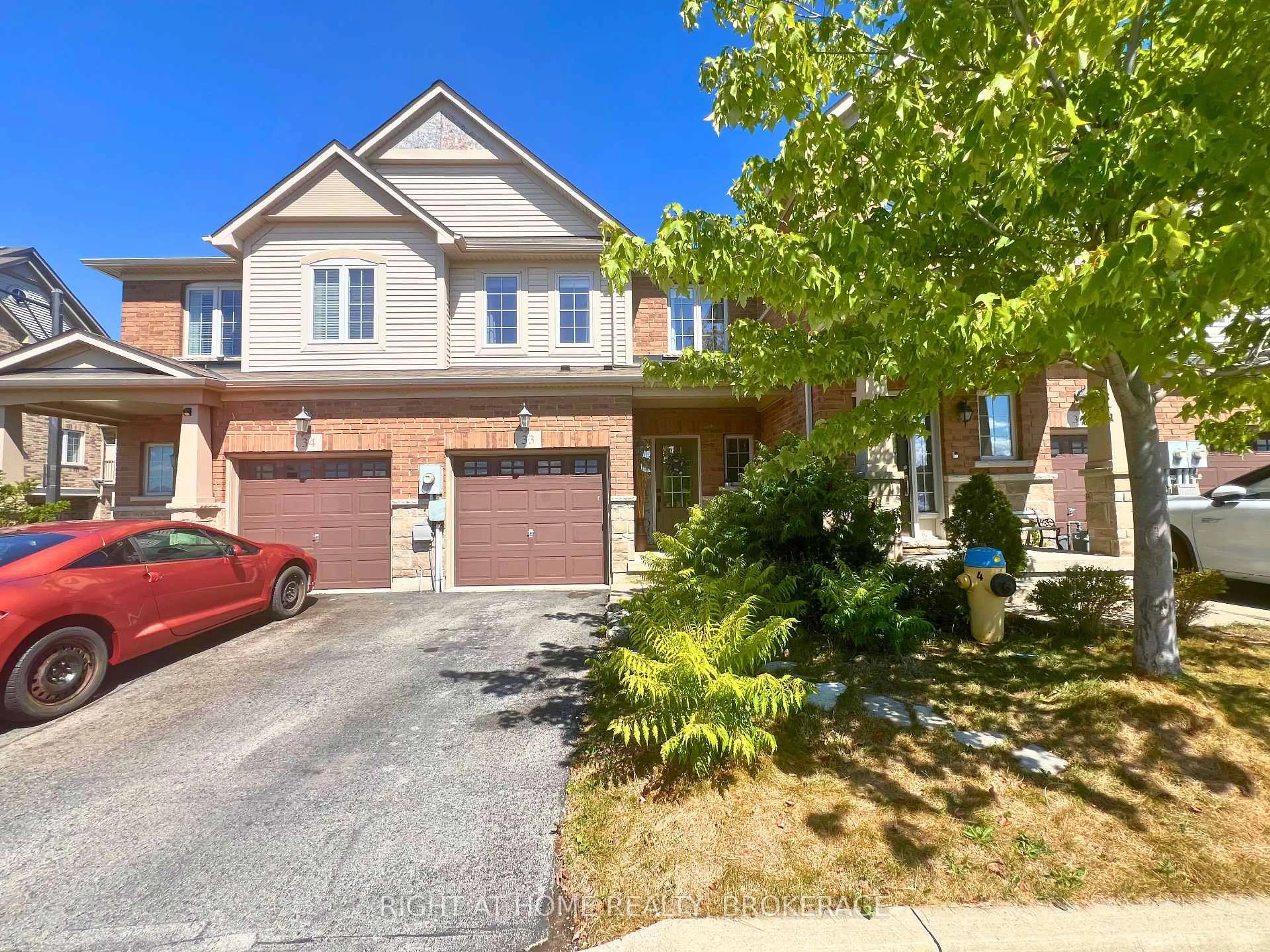 Home with brick exterior material, street for 541 WINSTON Rd #33, Grimsby Ontario L3M 0C5