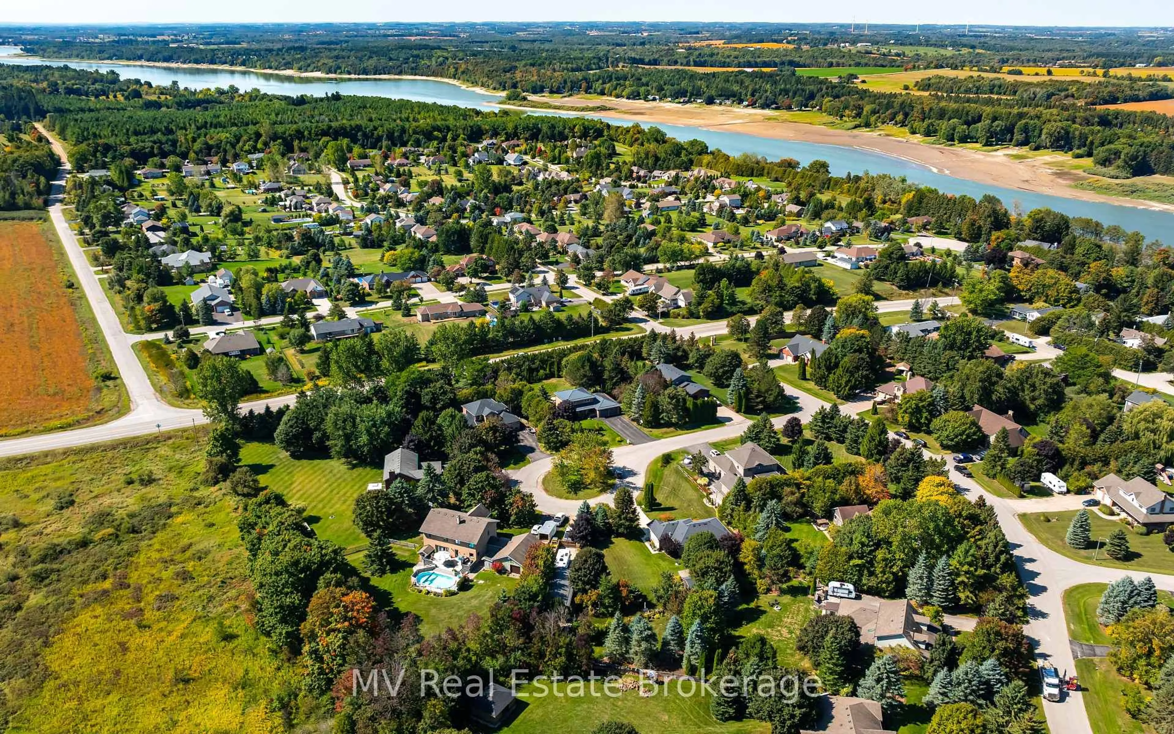 A pic from outside/outdoor area/front of a property/back of a property/a pic from drone, water/lake/river/ocean view for 4 Sargent Blvd, Centre Wellington Ontario N0B 1J0