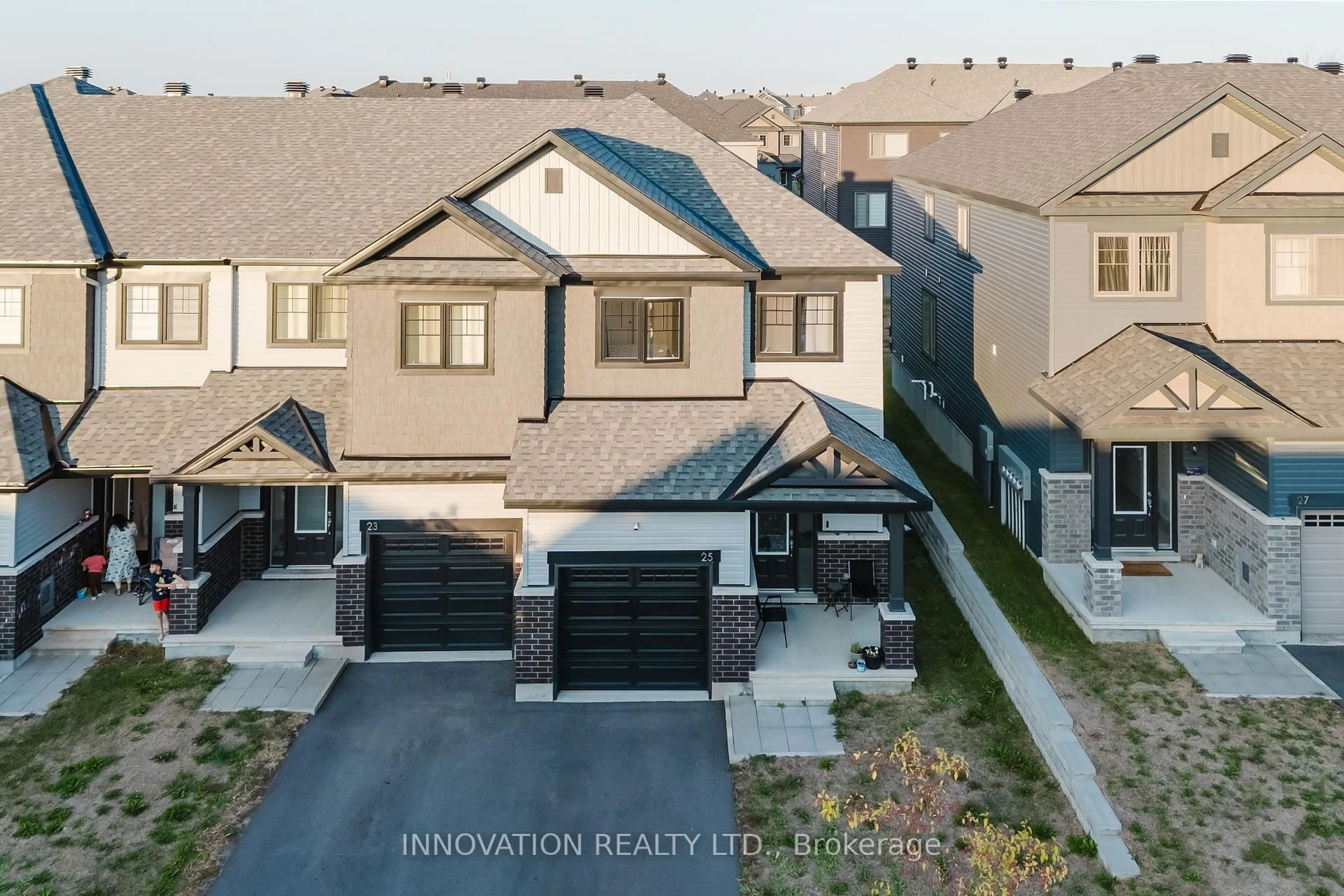 A pic from outside/outdoor area/front of a property/back of a property/a pic from drone, unknown for 25 Atop Lane, Ottawa Ontario K1X 1G6