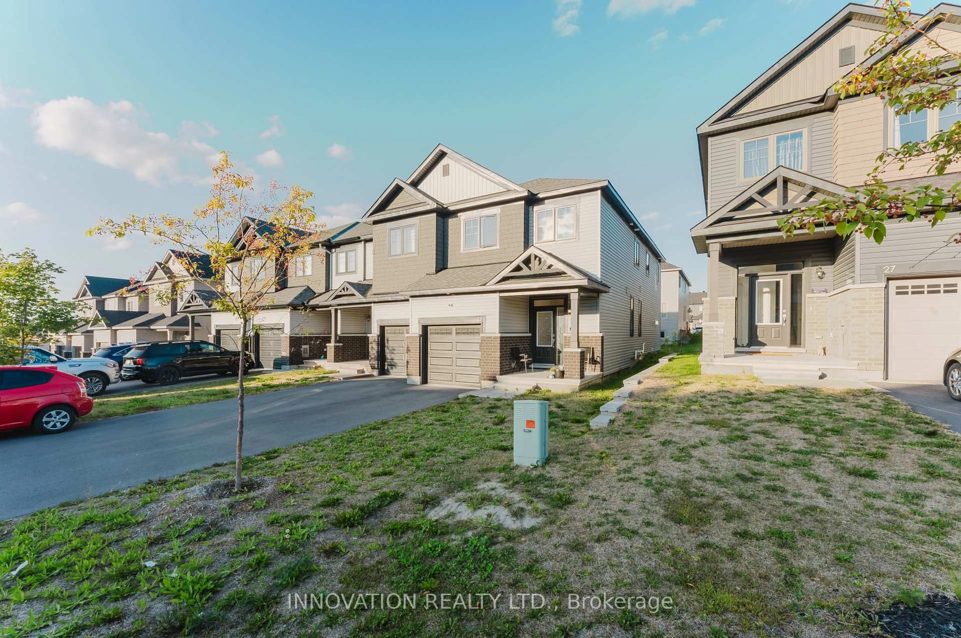 A pic from outside/outdoor area/front of a property/back of a property/a pic from drone, street for 25 Atop Lane, Ottawa Ontario K1X 1G6