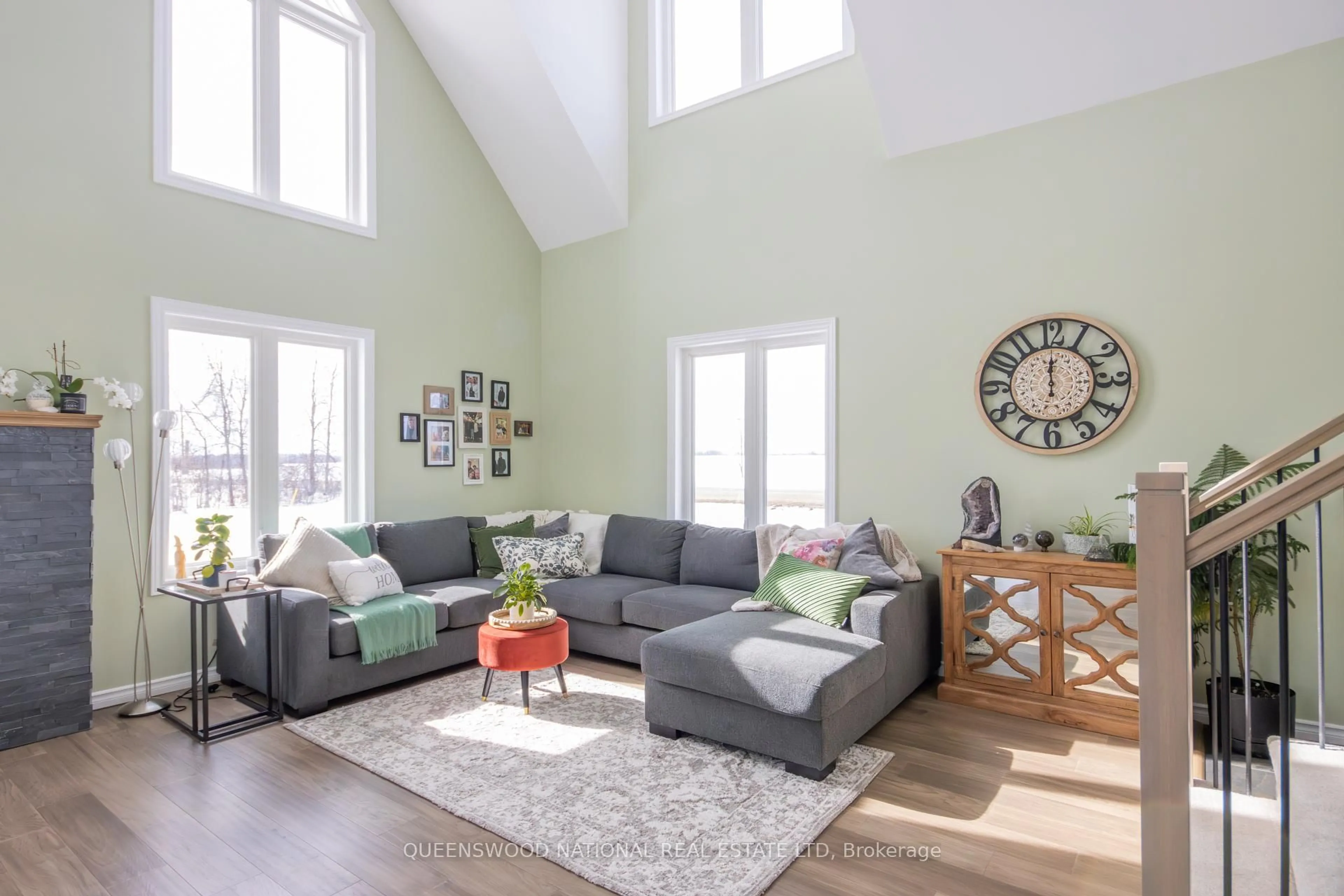 Living room with furniture, wood/laminate floor for 1010 Kilmarnock Rd, Merrickville-Wolford Ontario K0G 1J0