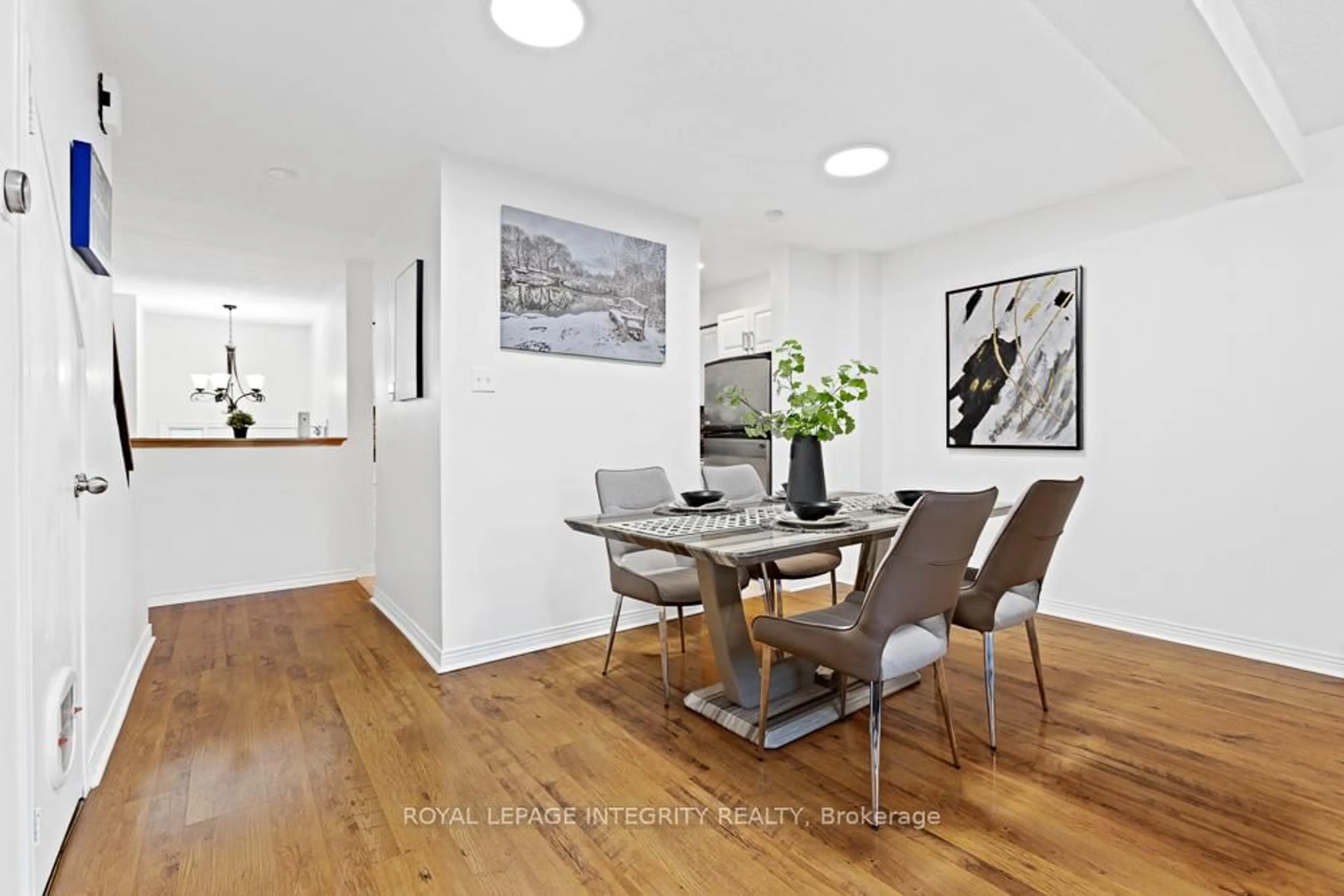 Dining room, wood/laminate floor for 498 Sandhamn Private, Ottawa Ontario K1T 2Z6