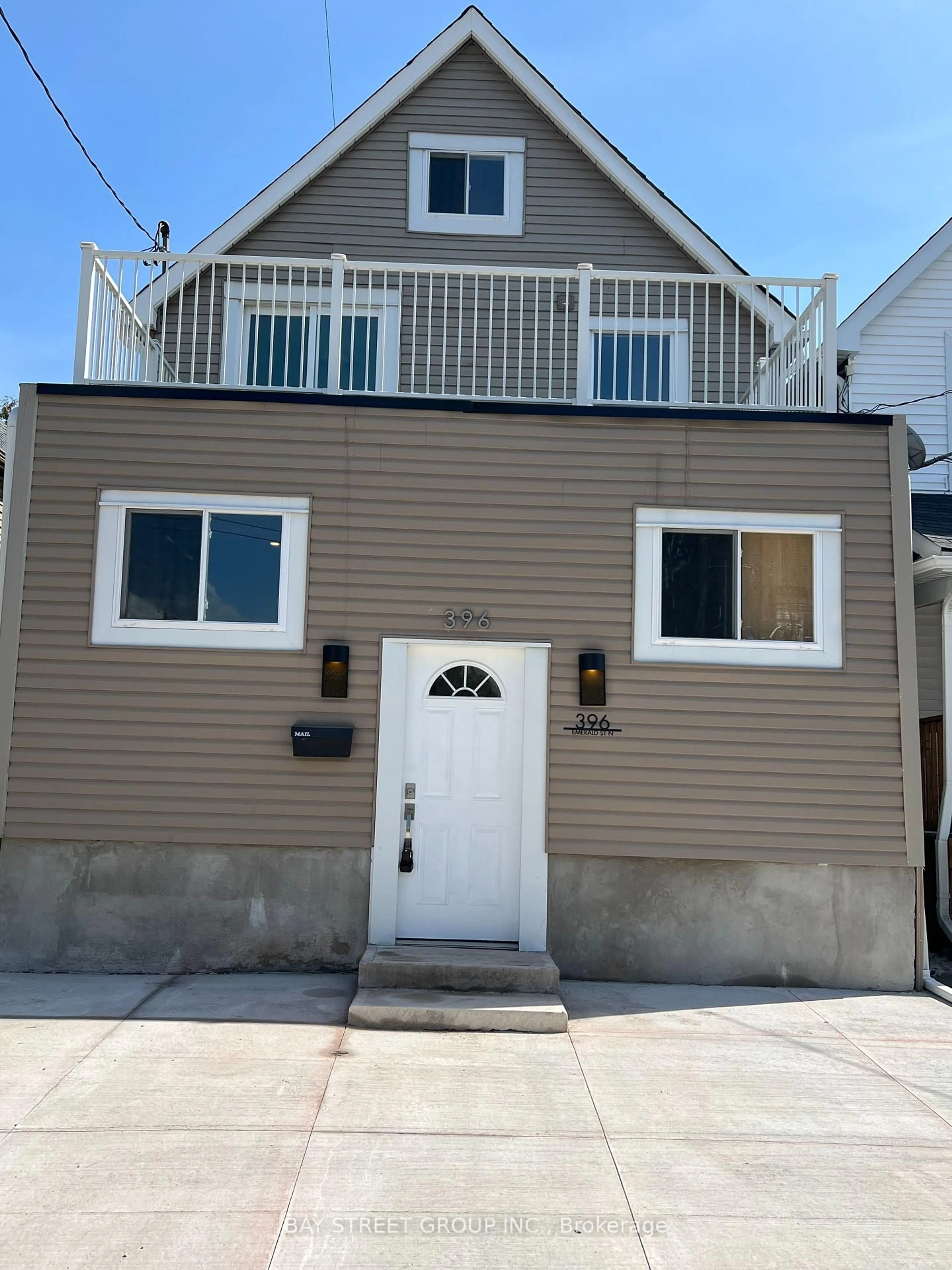 Home with vinyl exterior material, street for 396 Emerald St, Hamilton Ontario L8L 5L9
