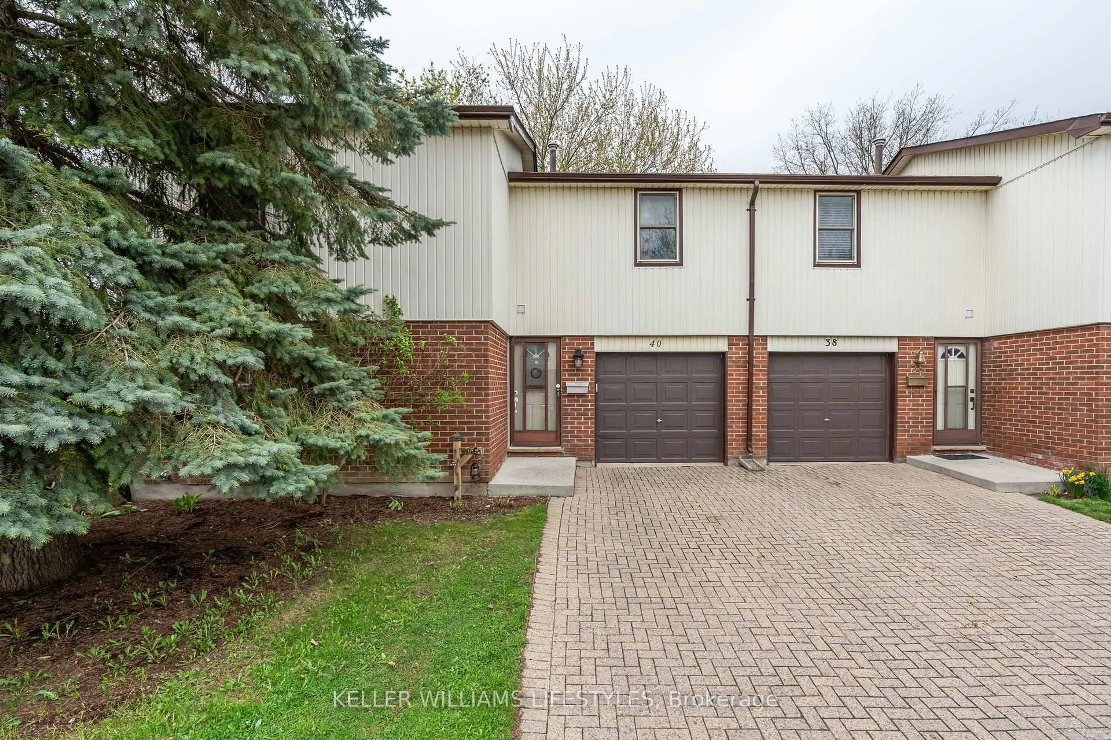 Home with brick exterior material, street for 971 Adelaide St #40, London South Ontario N6E 2H3