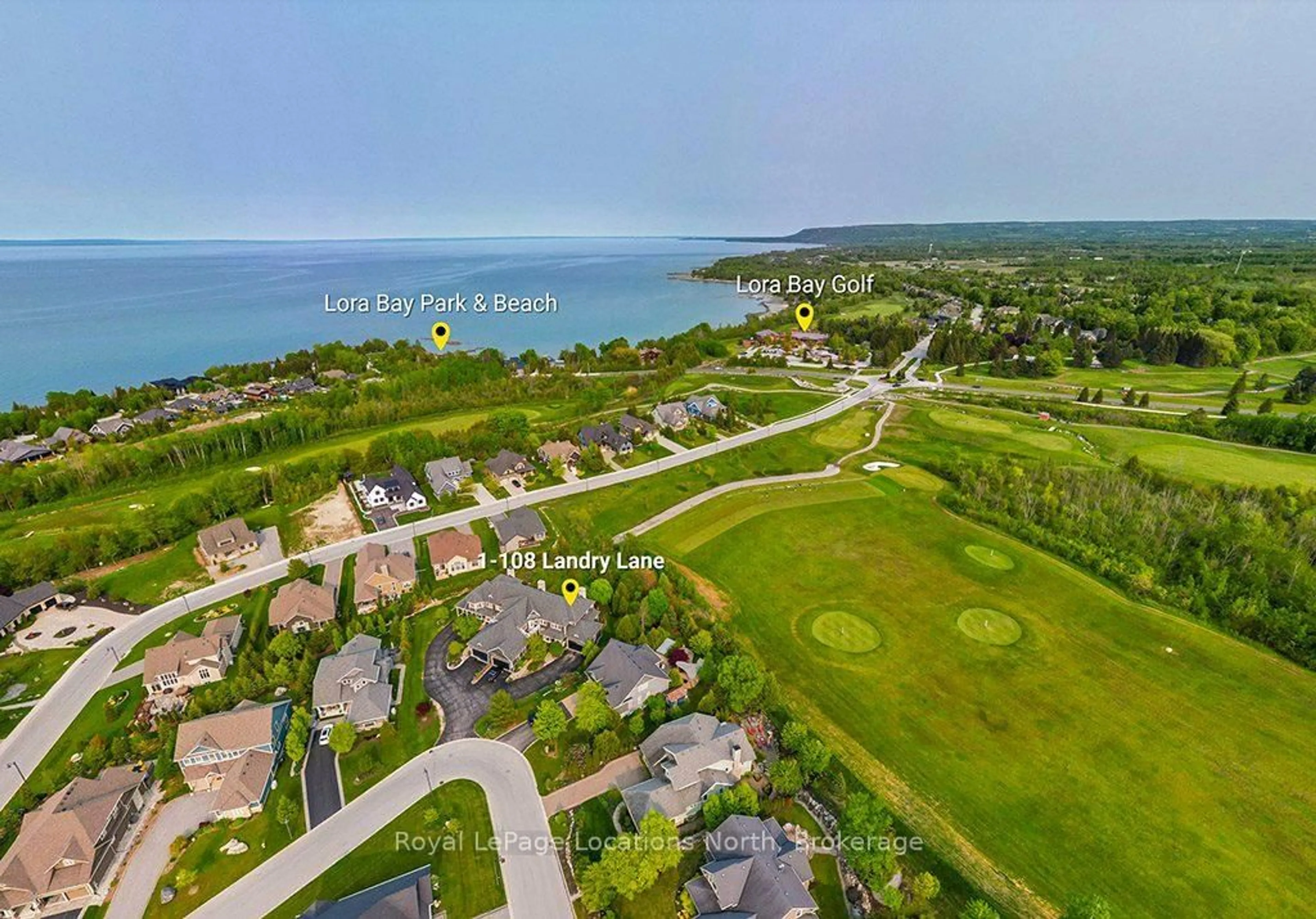 A pic from outside/outdoor area/front of a property/back of a property/a pic from drone, water/lake/river/ocean view for 108 LANDRY Lane #1, Blue Mountains Ontario N0H 2P0