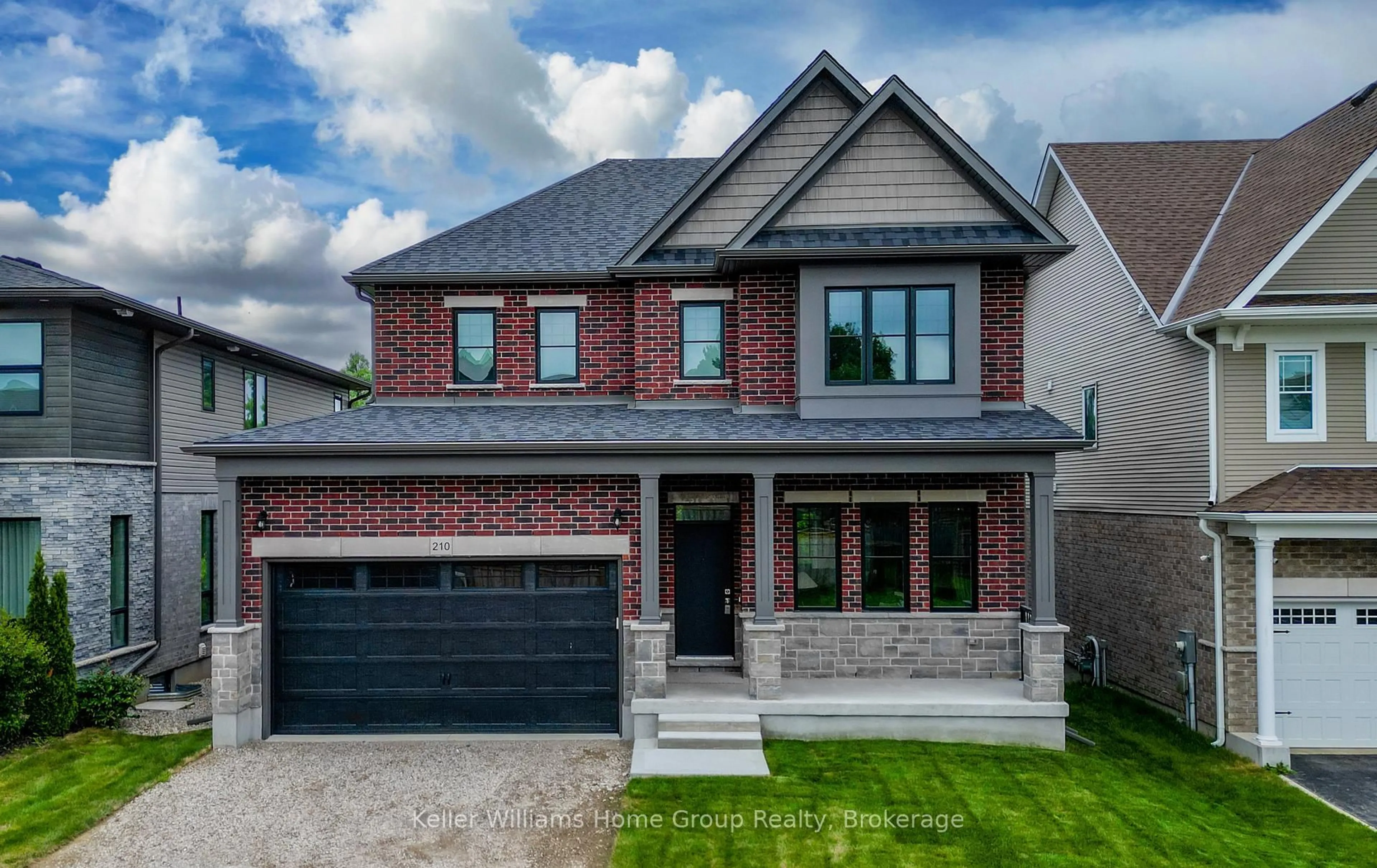 Home with brick exterior material, street for 210 Carrington Dr, Guelph Ontario N1G 0G9