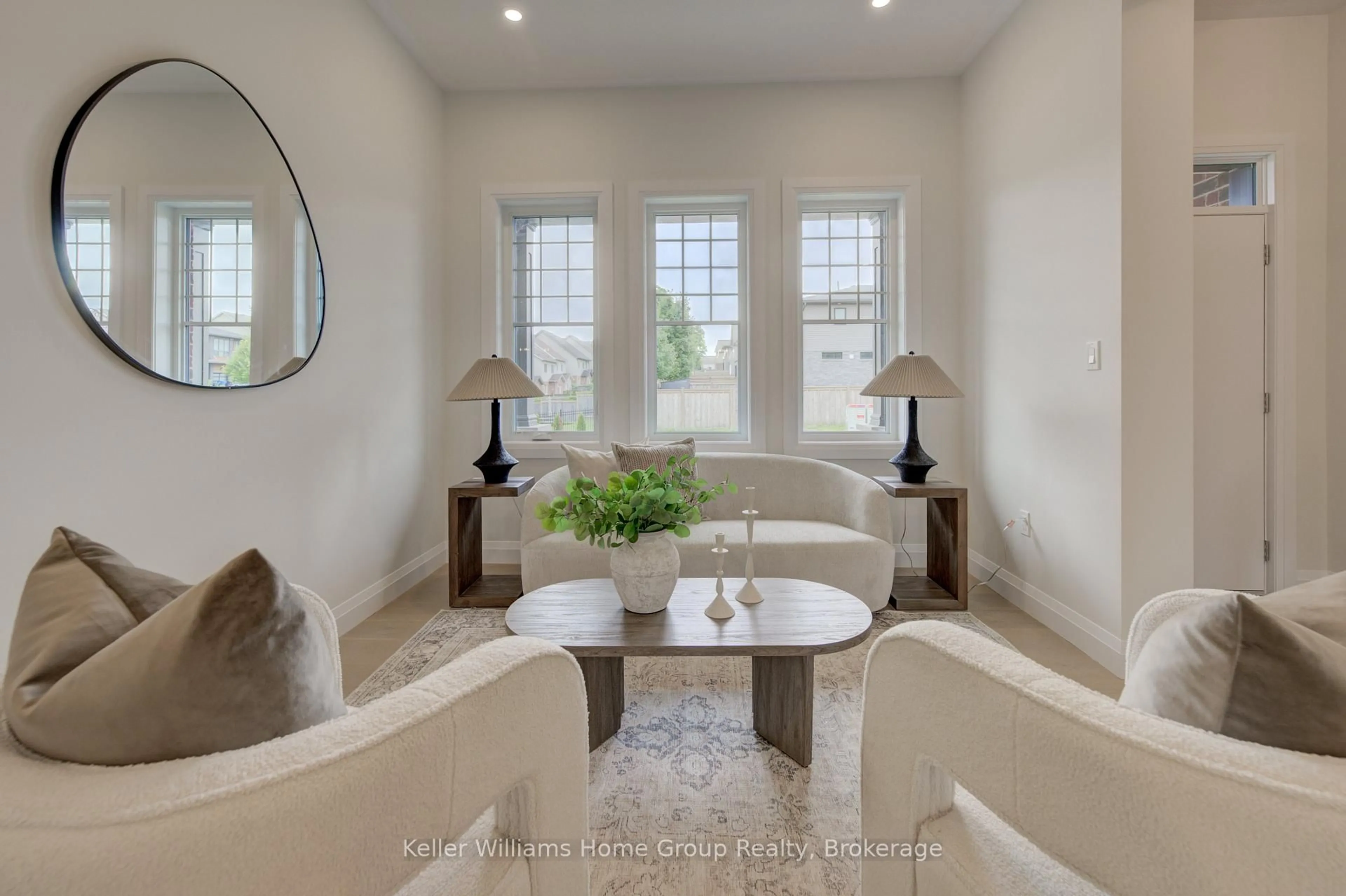 Living room with furniture, ceramic/tile floor for 210 Carrington Dr, Guelph Ontario N1G 0G9