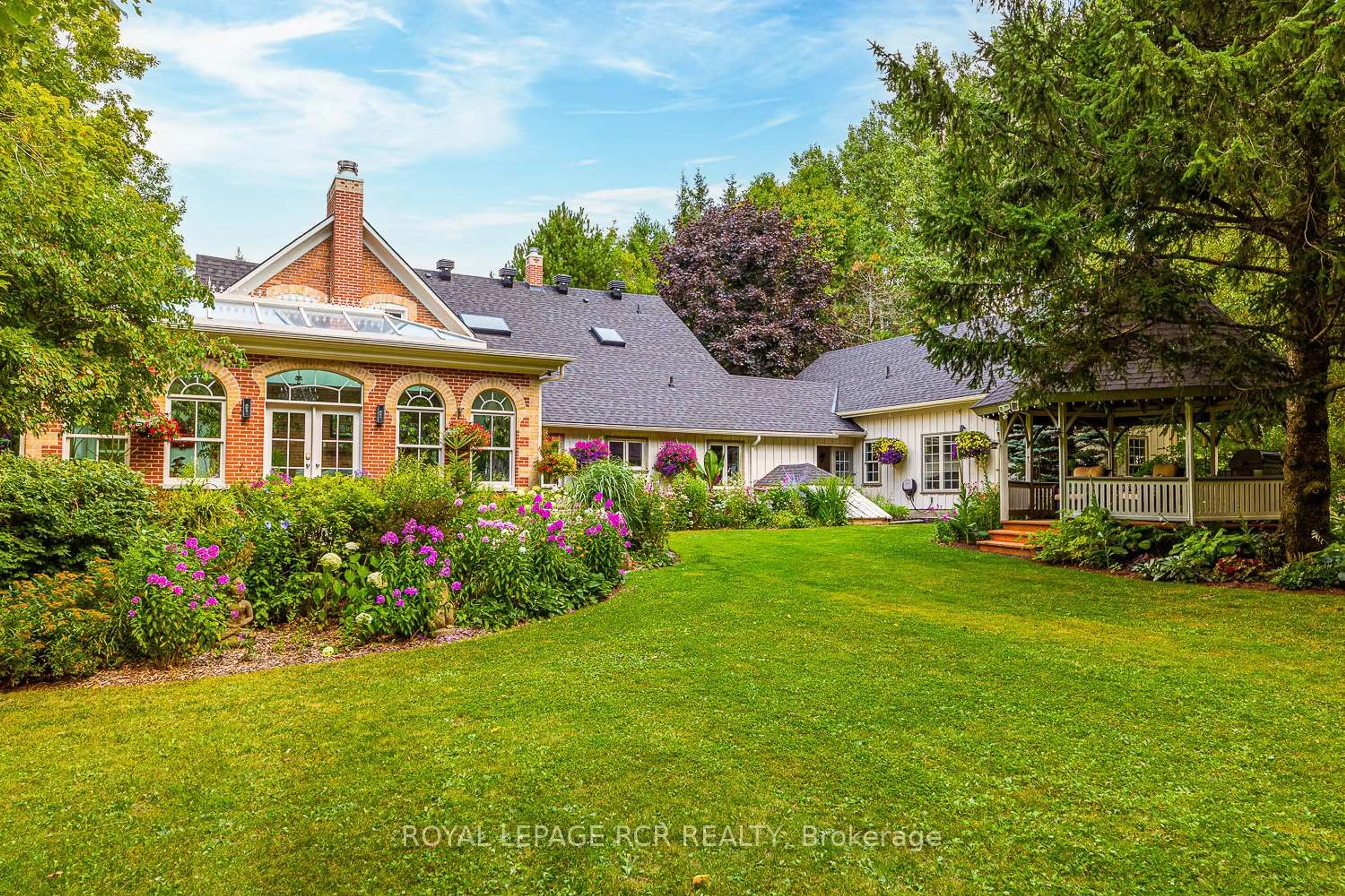 A pic from outside/outdoor area/front of a property/back of a property/a pic from drone, street for 282398 County Rd 10, East Luther Grand Valley Ontario L9W 0W6
