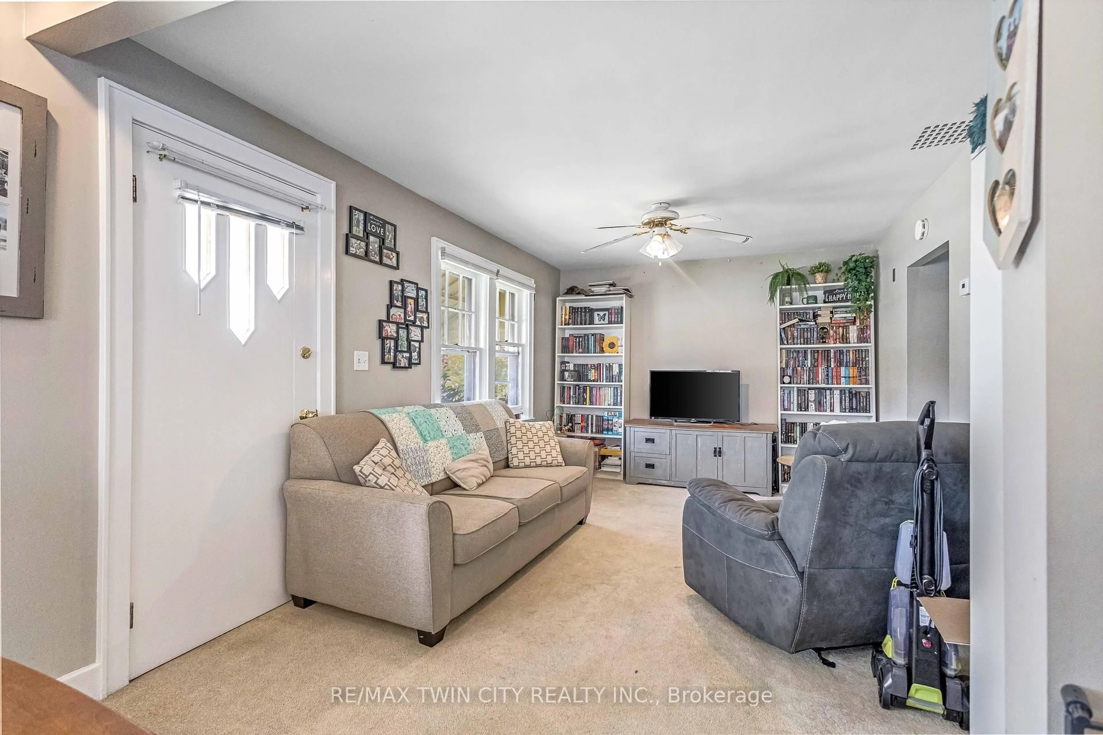 Living room with furniture, ceramic/tile floor for 493 St Paul Ave, Brant Ontario N3R 4P4