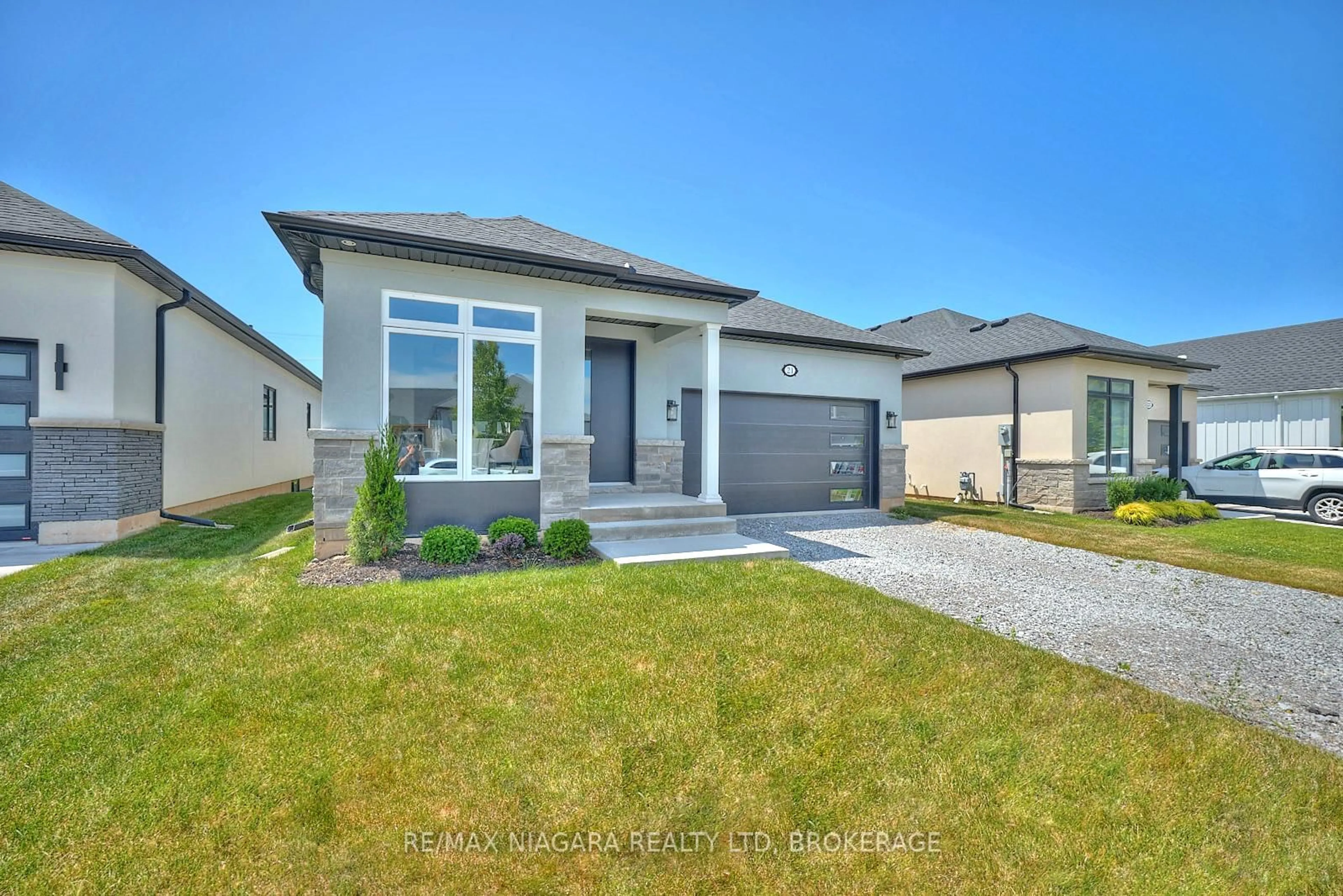 Home with brick exterior material, street for 21 Sunrise Crt, Fort Erie Ontario L0S 1N0