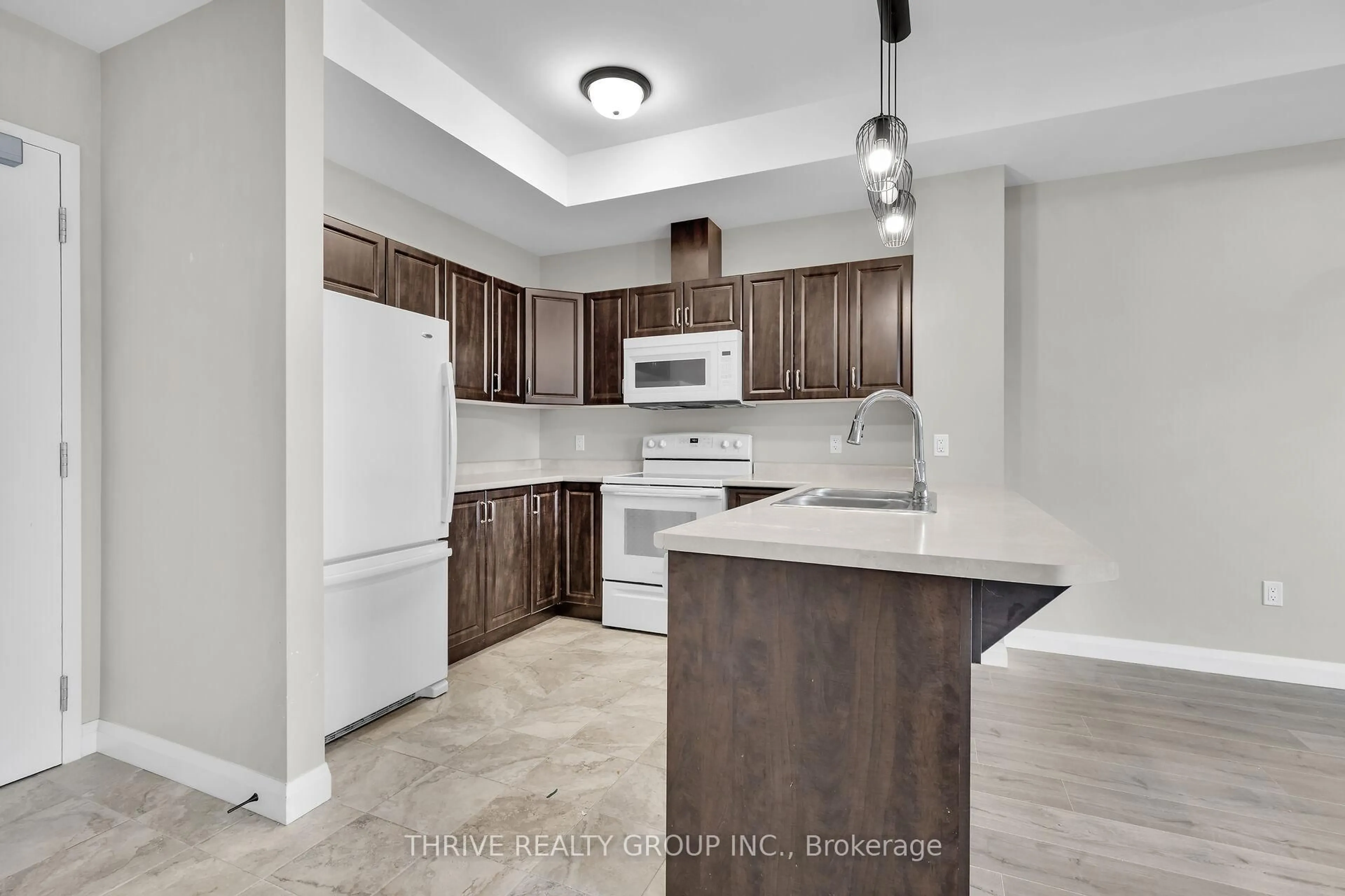 Open concept kitchen, unknown for 263 Butler St #301, Lucan Biddulph Ontario N0M 2J0