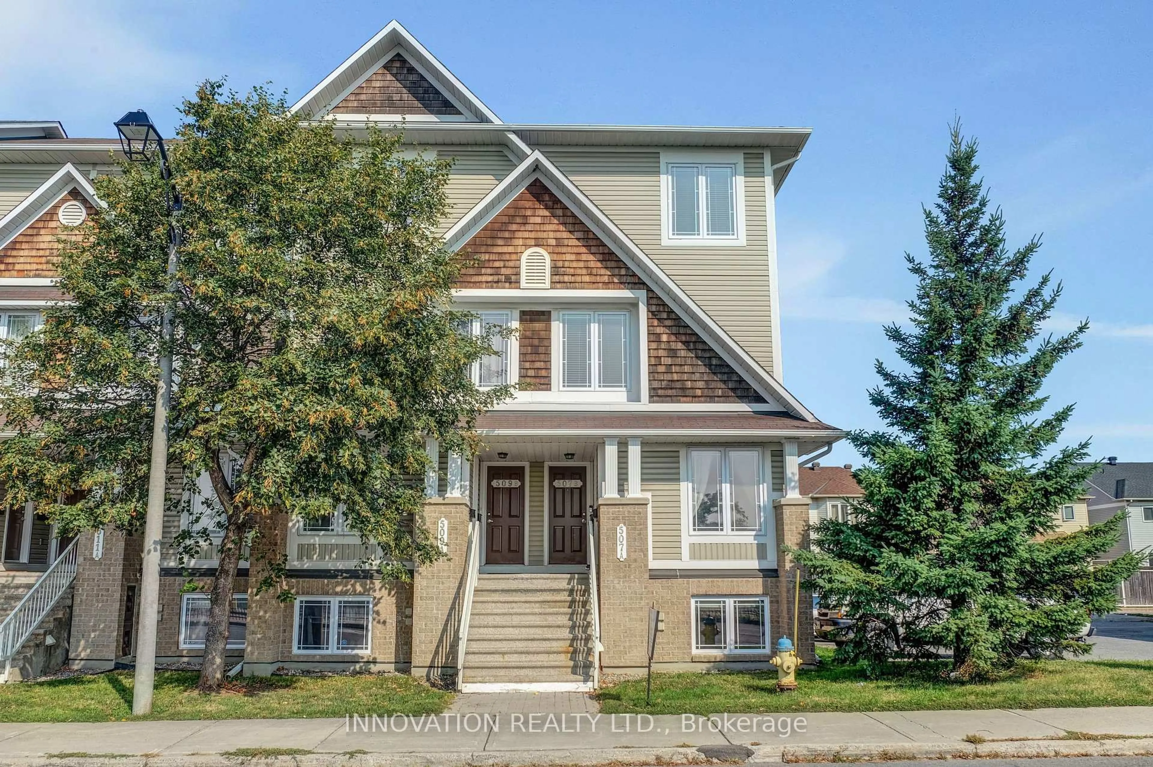 Home with brick exterior material, street for 507 B Chapman Mills Dr #49, Ottawa Ontario K2J 0M8