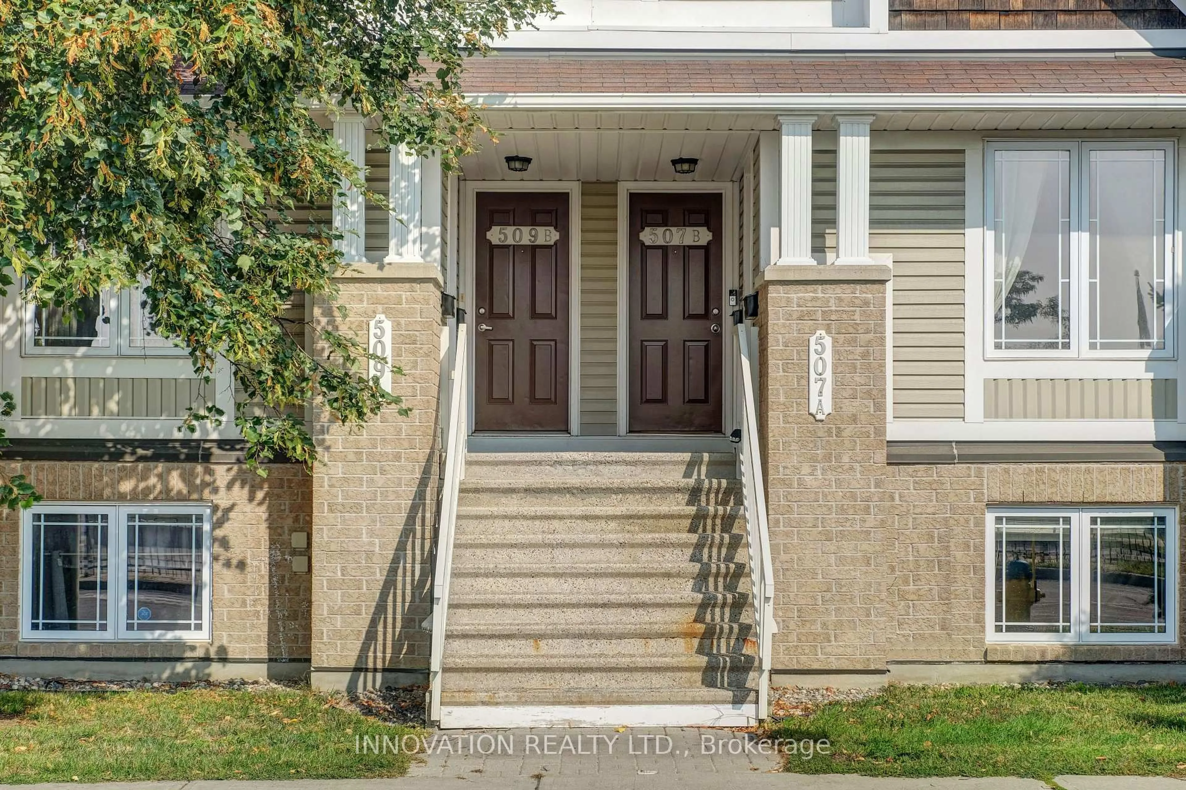 Home with brick exterior material, street for 507 B Chapman Mills Dr #49, Ottawa Ontario K2J 0M8
