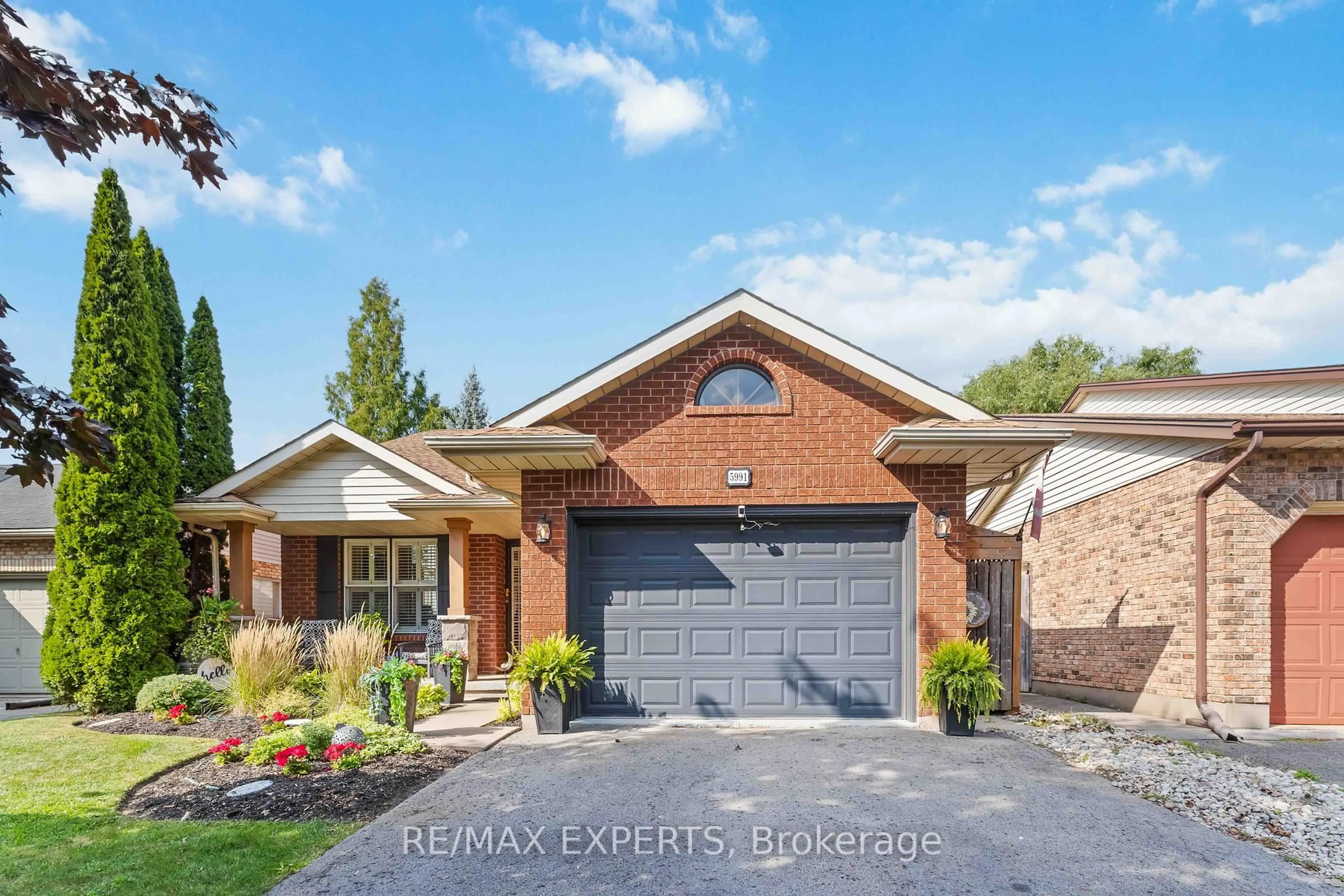 Home with brick exterior material, street for 5991 Andrea Dr, Niagara Falls Ontario L2H 2Z9
