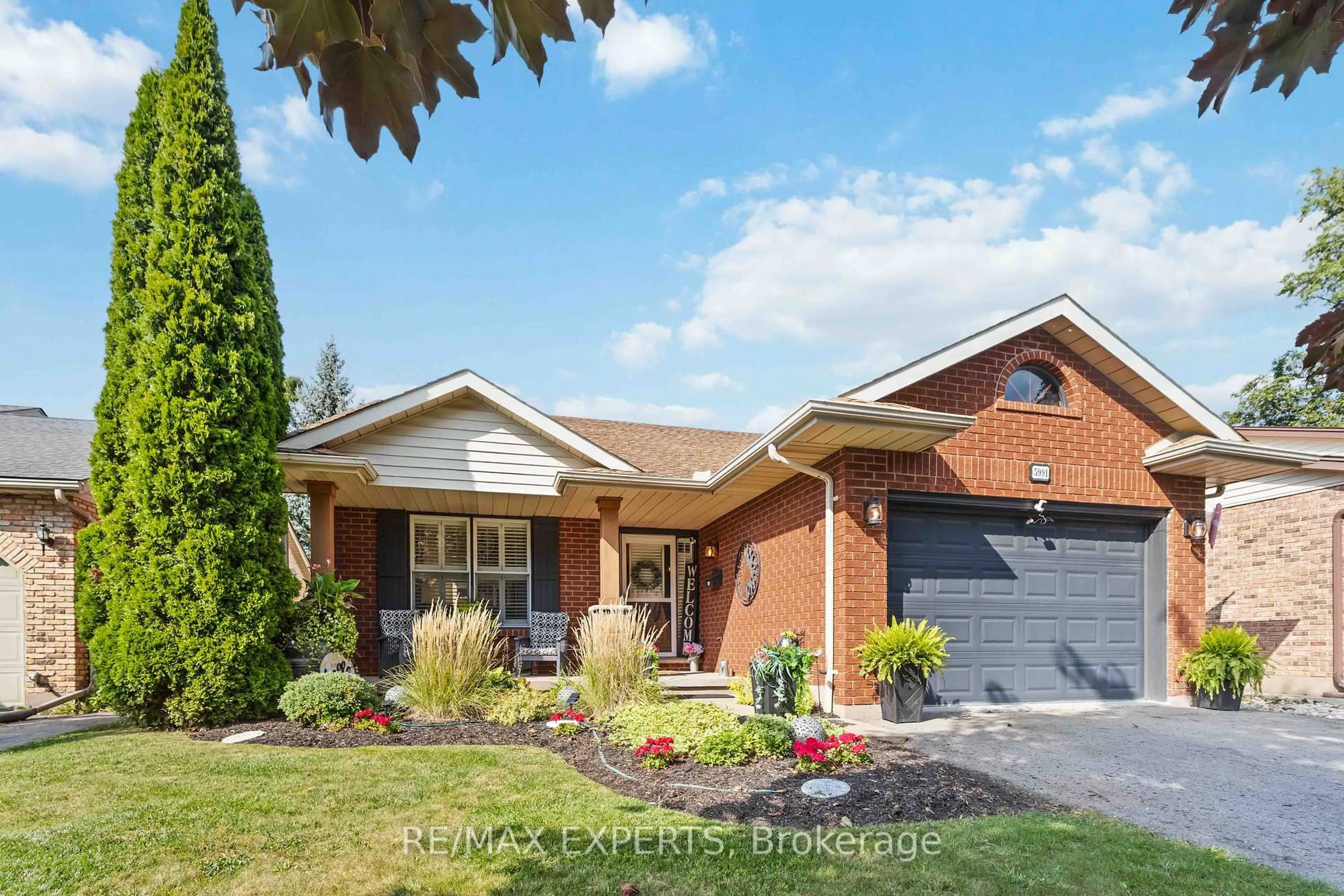 Home with brick exterior material, street for 5991 Andrea Dr, Niagara Falls Ontario L2H 2Z9