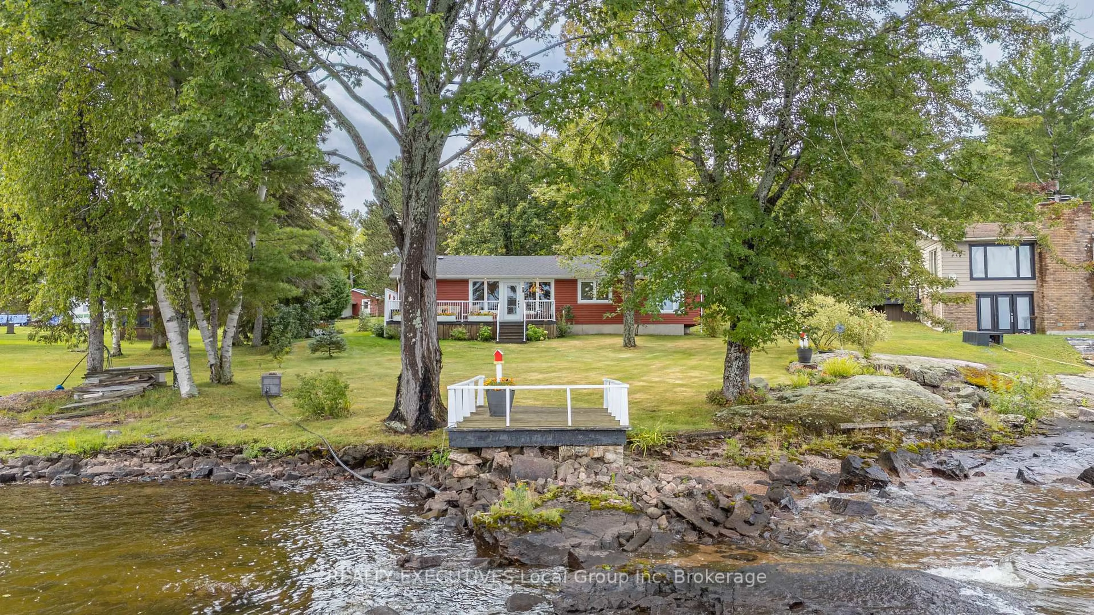 A pic from outside/outdoor area/front of a property/back of a property/a pic from drone, water/lake/river/ocean view for 4 NINOVAN Rd, Callander Ontario P0H 1H0