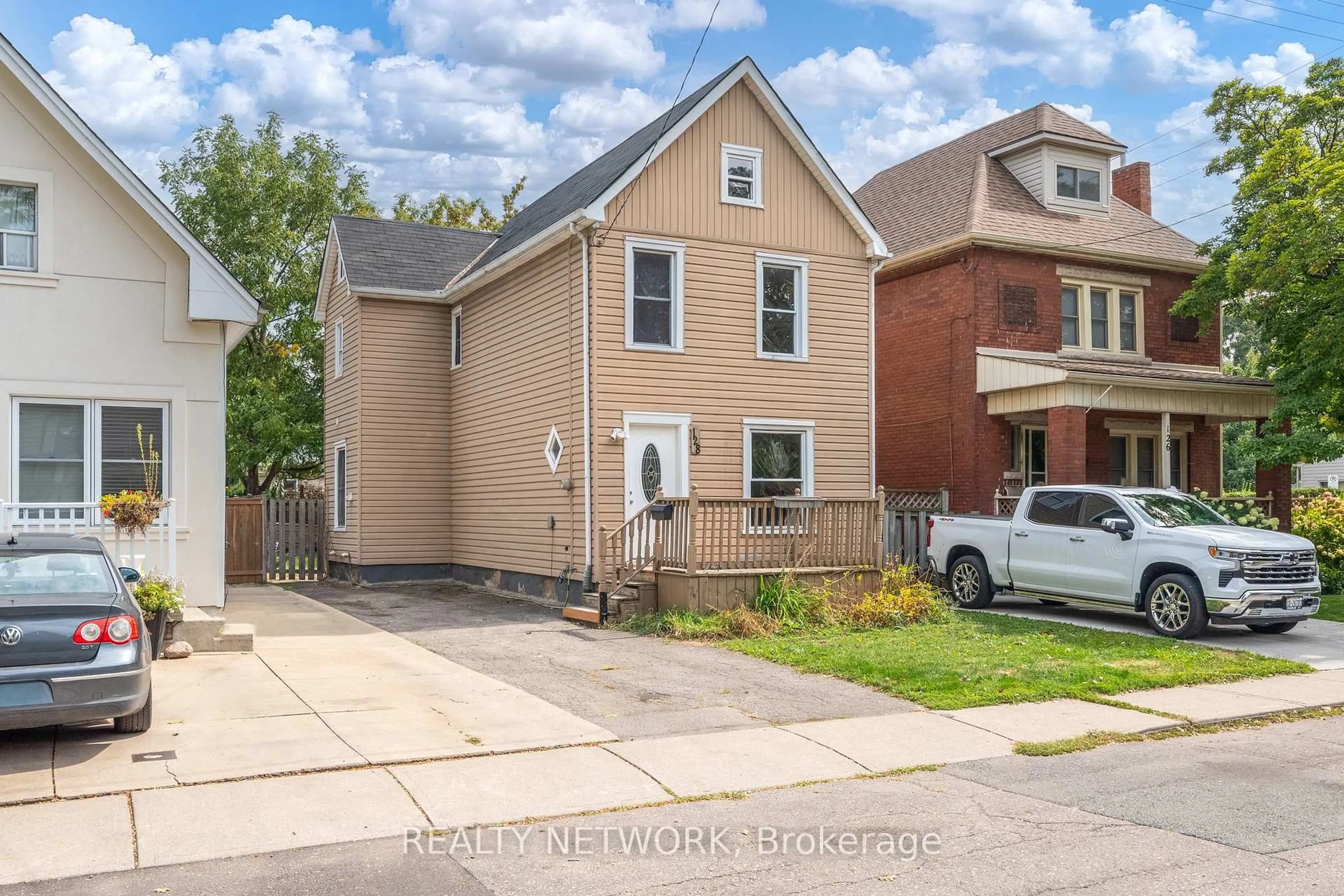 Home with brick exterior material, street for 128 Kensington Ave, Hamilton Ontario L8L 7N5