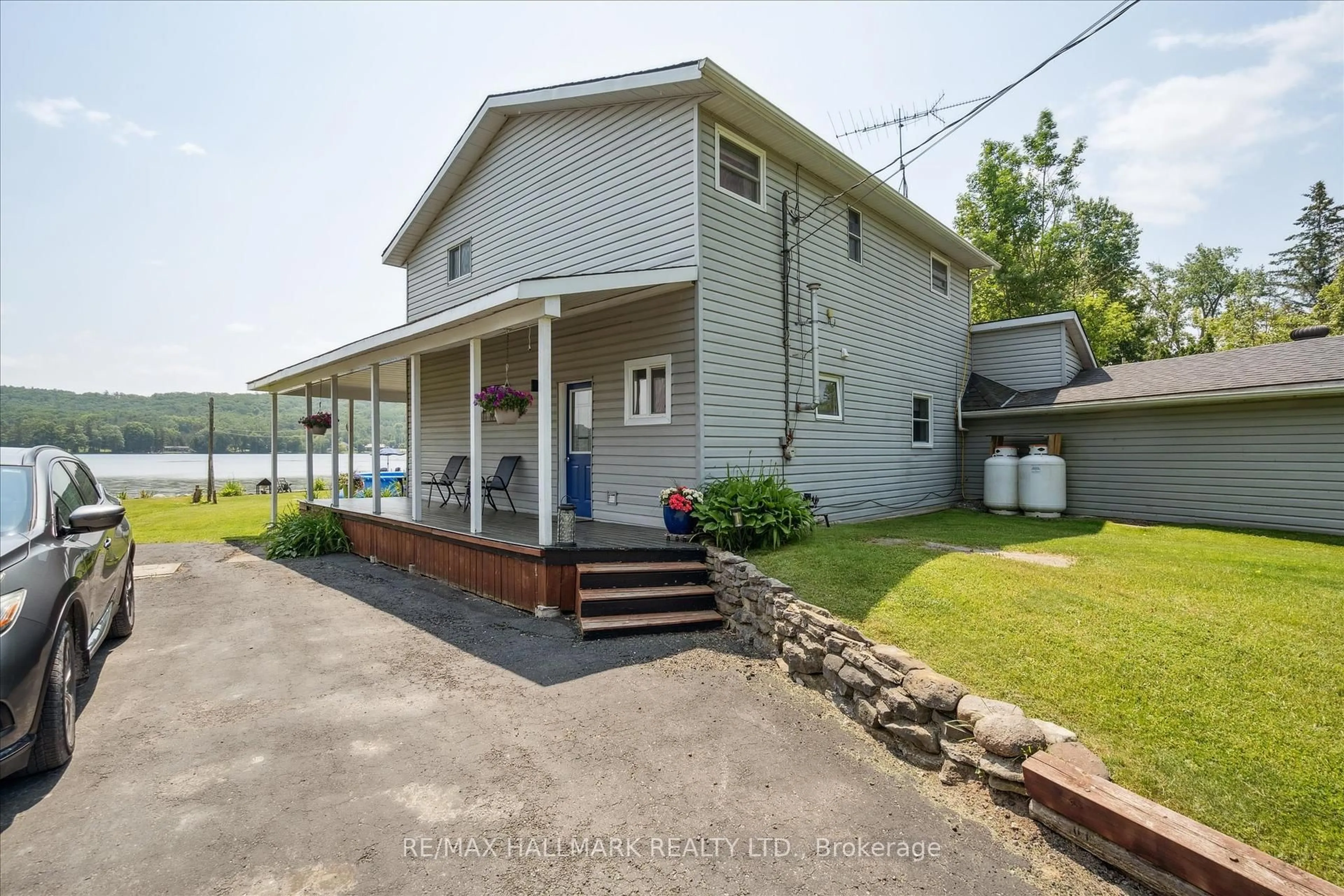 A pic from outside/outdoor area/front of a property/back of a property/a pic from drone, water/lake/river/ocean view for 165 Trentside Lane, Hastings Ontario K0K 2C0