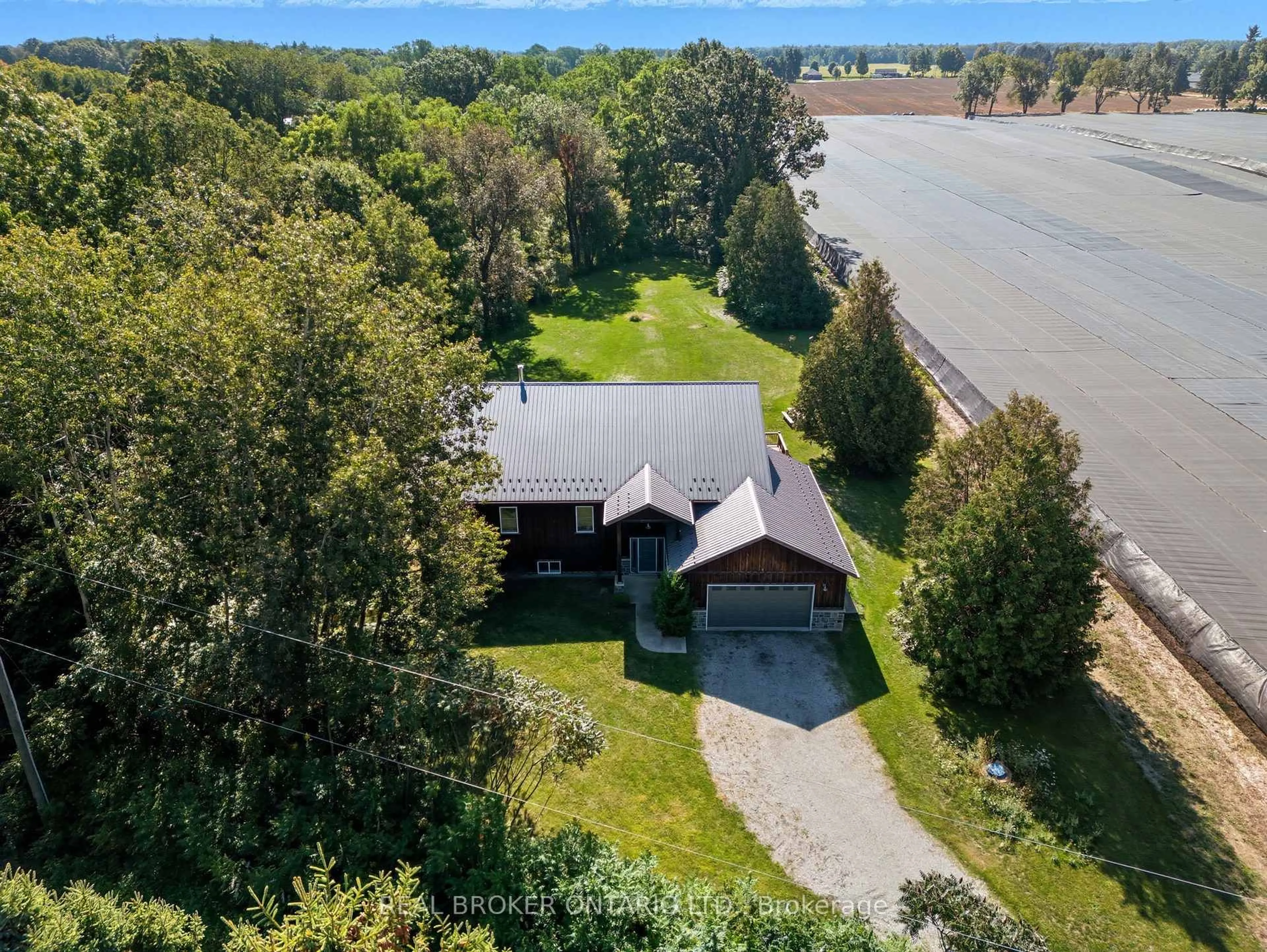 A pic from outside/outdoor area/front of a property/back of a property/a pic from drone, water/lake/river/ocean view for 126 Shorties Sdrd, Norfolk Ontario N4G 4G9