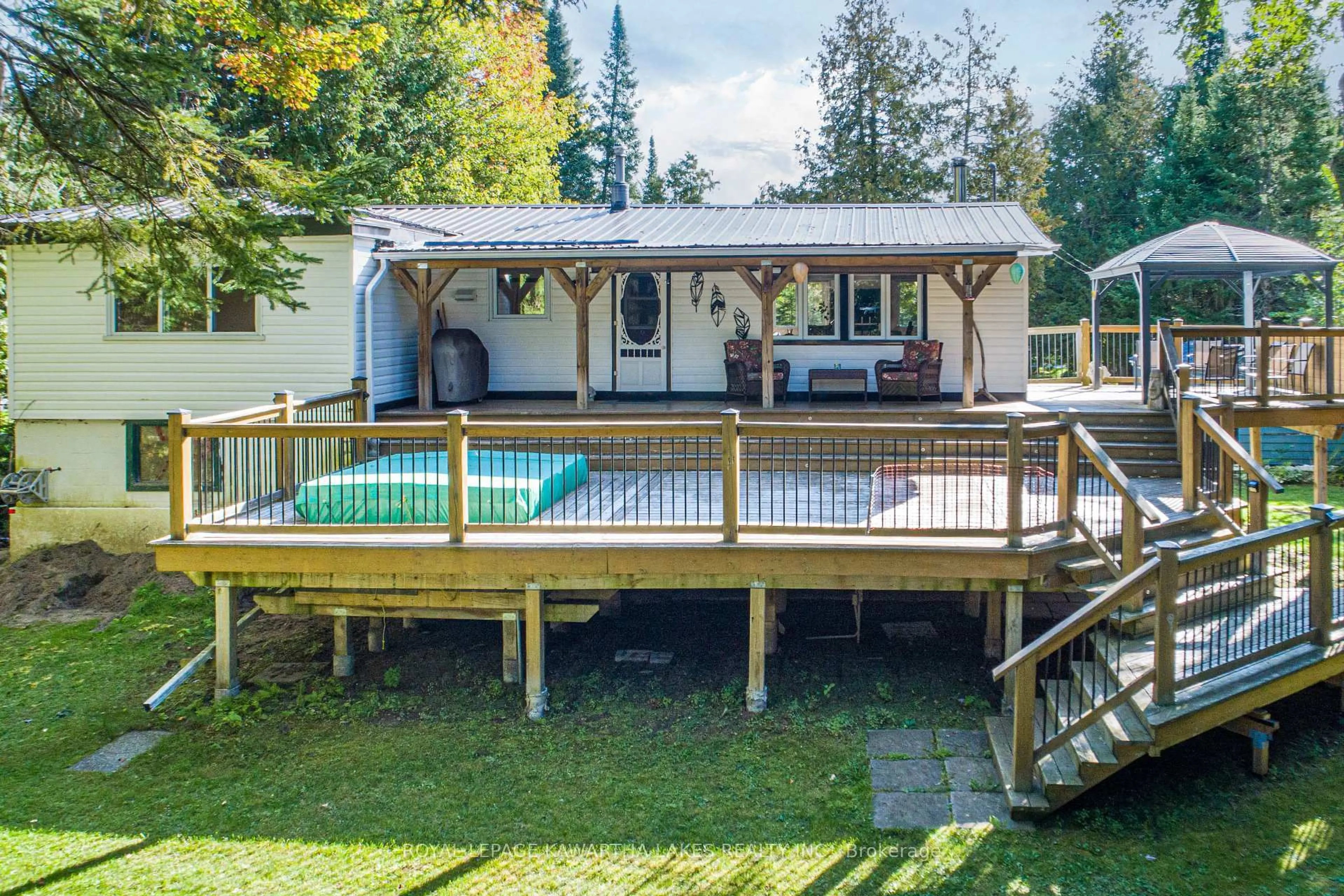 A pic from outside/outdoor area/front of a property/back of a property/a pic from drone, water/lake/river/ocean view for 72 River Rd, Kawartha Lakes Ontario K0M 1N0