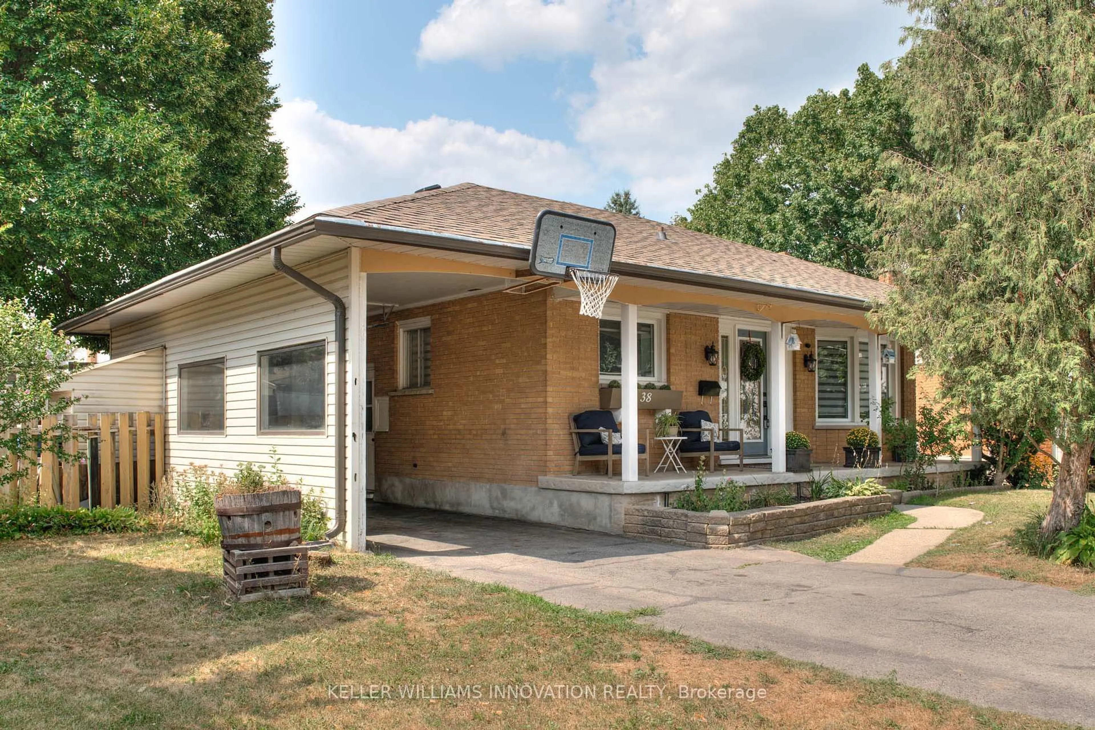 Home with brick exterior material, street for 38 Fairlawn Rd, Kitchener Ontario N2C 1X9