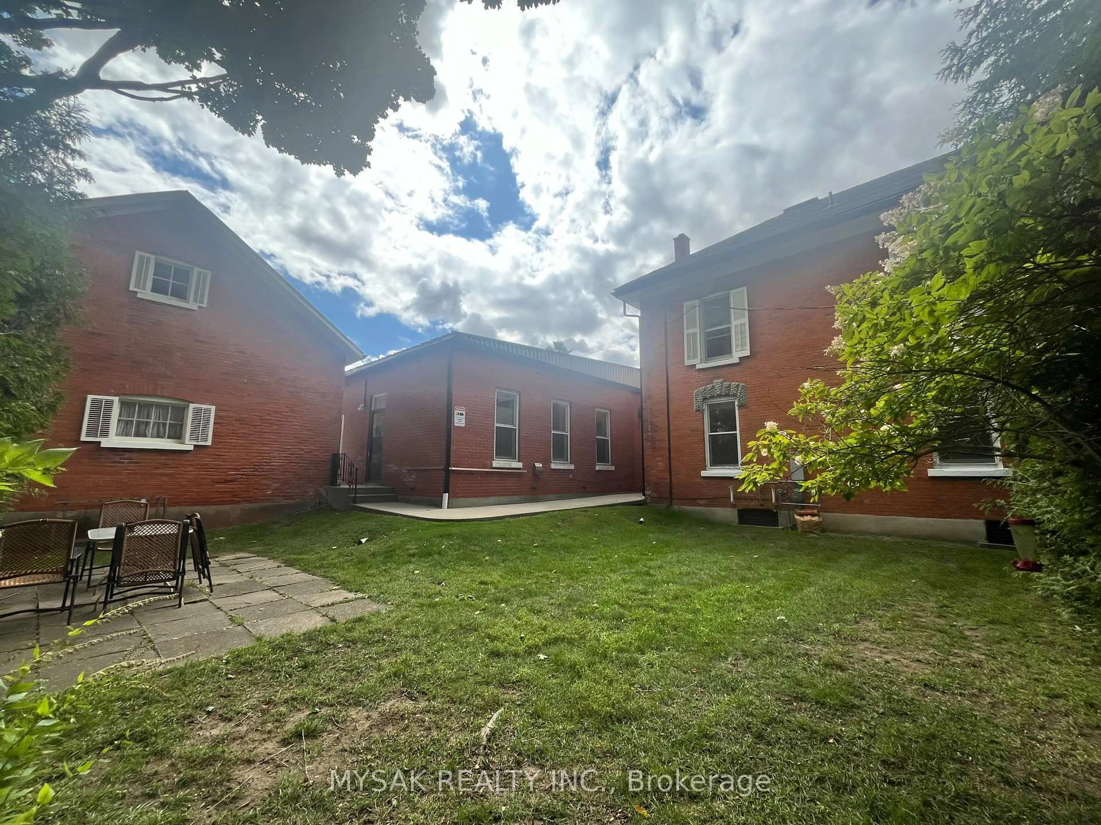 A pic from outside/outdoor area/front of a property/back of a property/a pic from drone, unknown for 315 Centre St, North Huron Ontario N0G 2W0