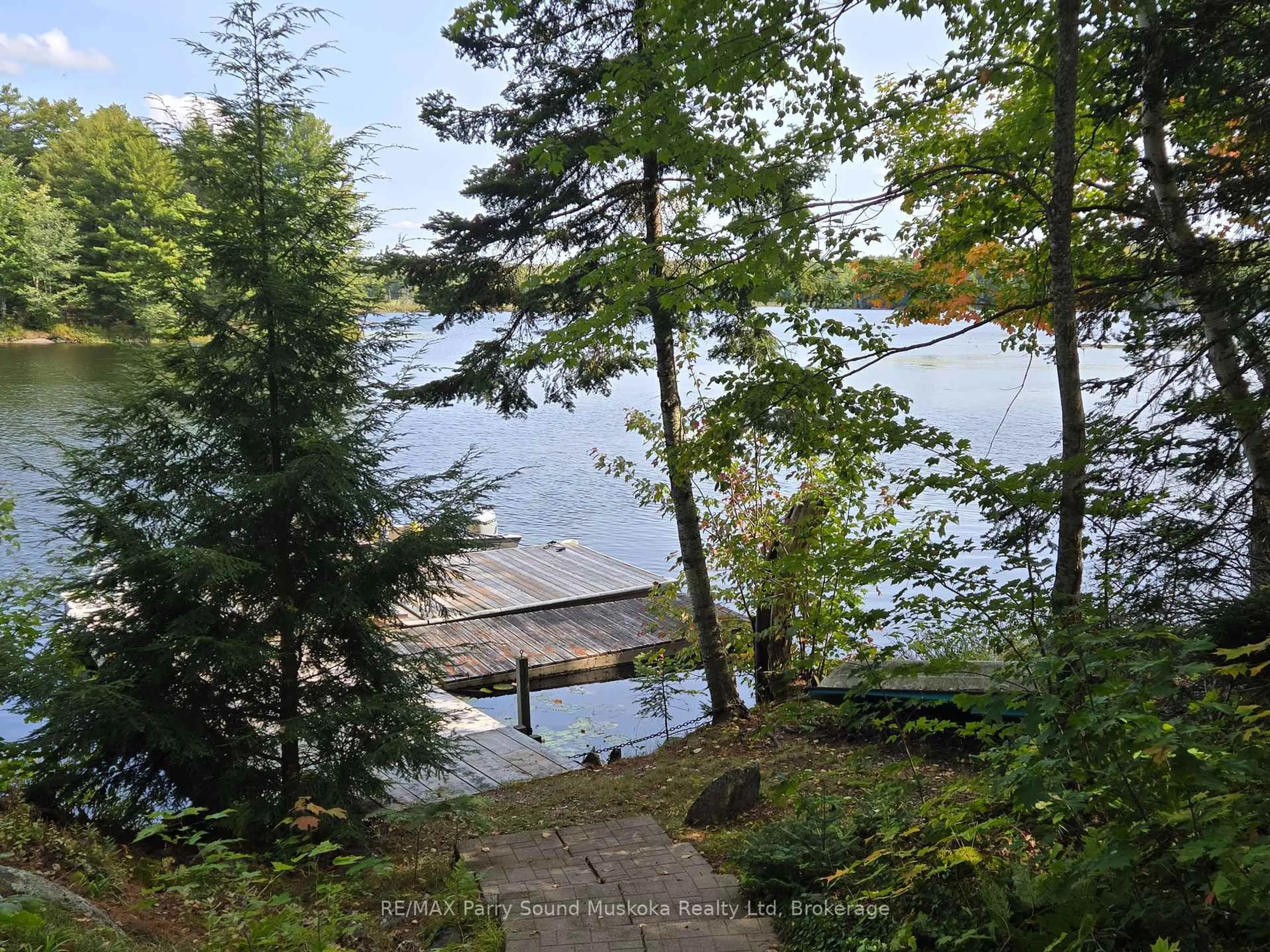 A pic from outside/outdoor area/front of a property/back of a property/a pic from drone, water/lake/river/ocean view for 216 Lorimer Lake, Whitestone Ontario P0A 1G0