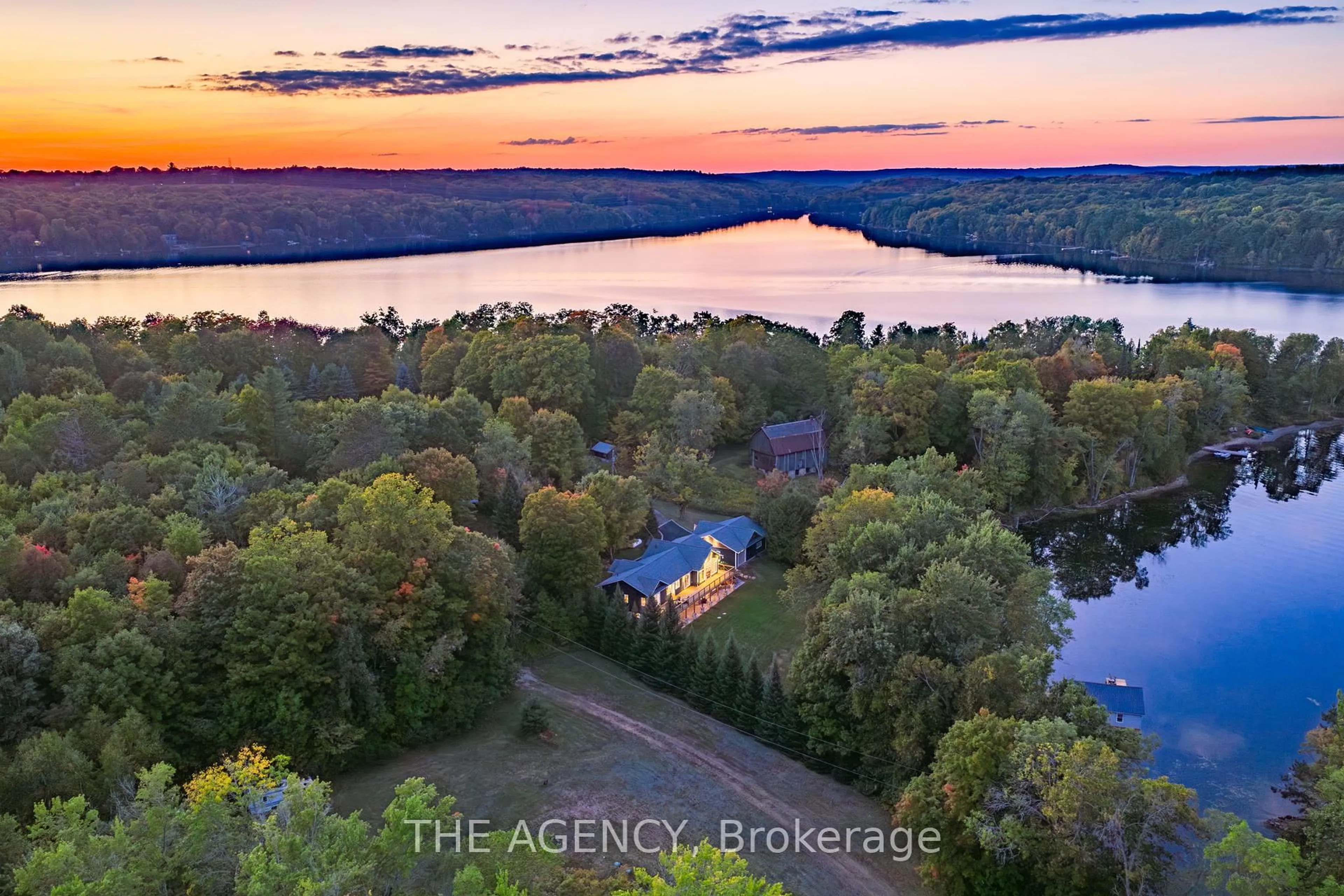 A pic from outside/outdoor area/front of a property/back of a property/a pic from drone, water/lake/river/ocean view for 1158 Camp Gayventure Crt, Minden Hills Ontario K0M 2K0