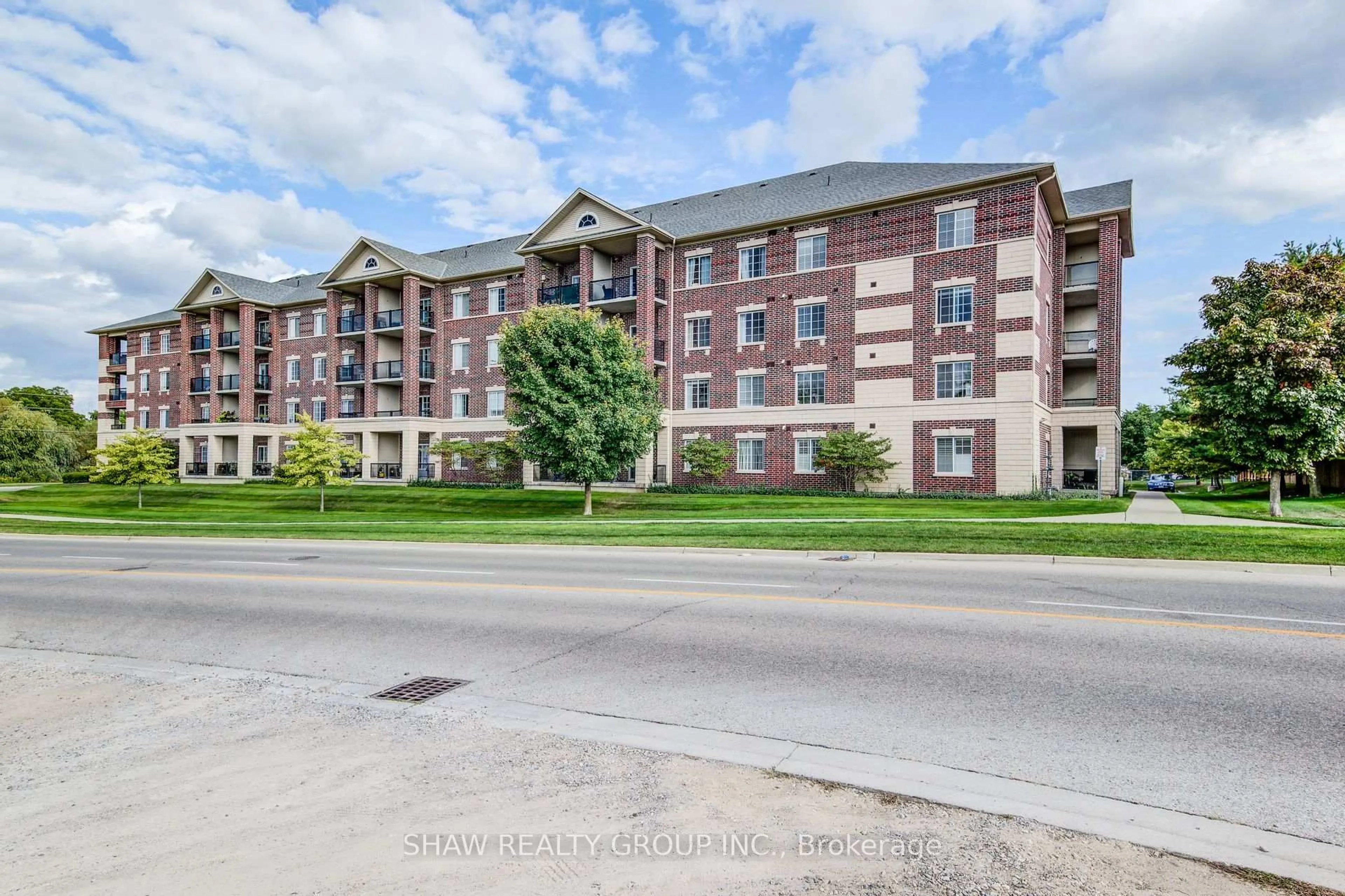 A pic from outside/outdoor area/front of a property/back of a property/a pic from drone, building for 308 Watson Pkwy #118, Guelph Ontario N1E 0G7
