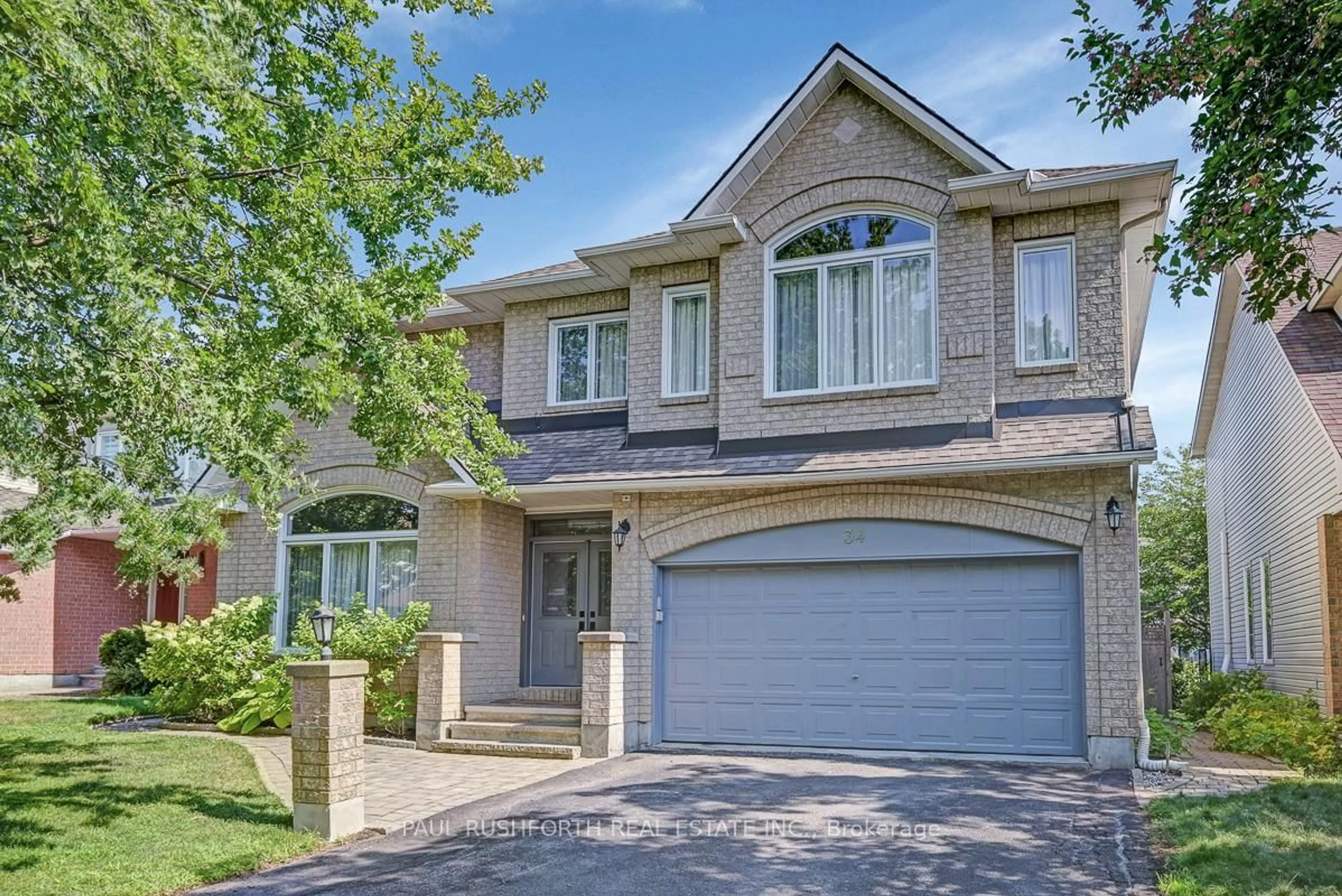 Home with brick exterior material, street for 34 Apple Creek Cres, Kanata Ontario K2M 2N3