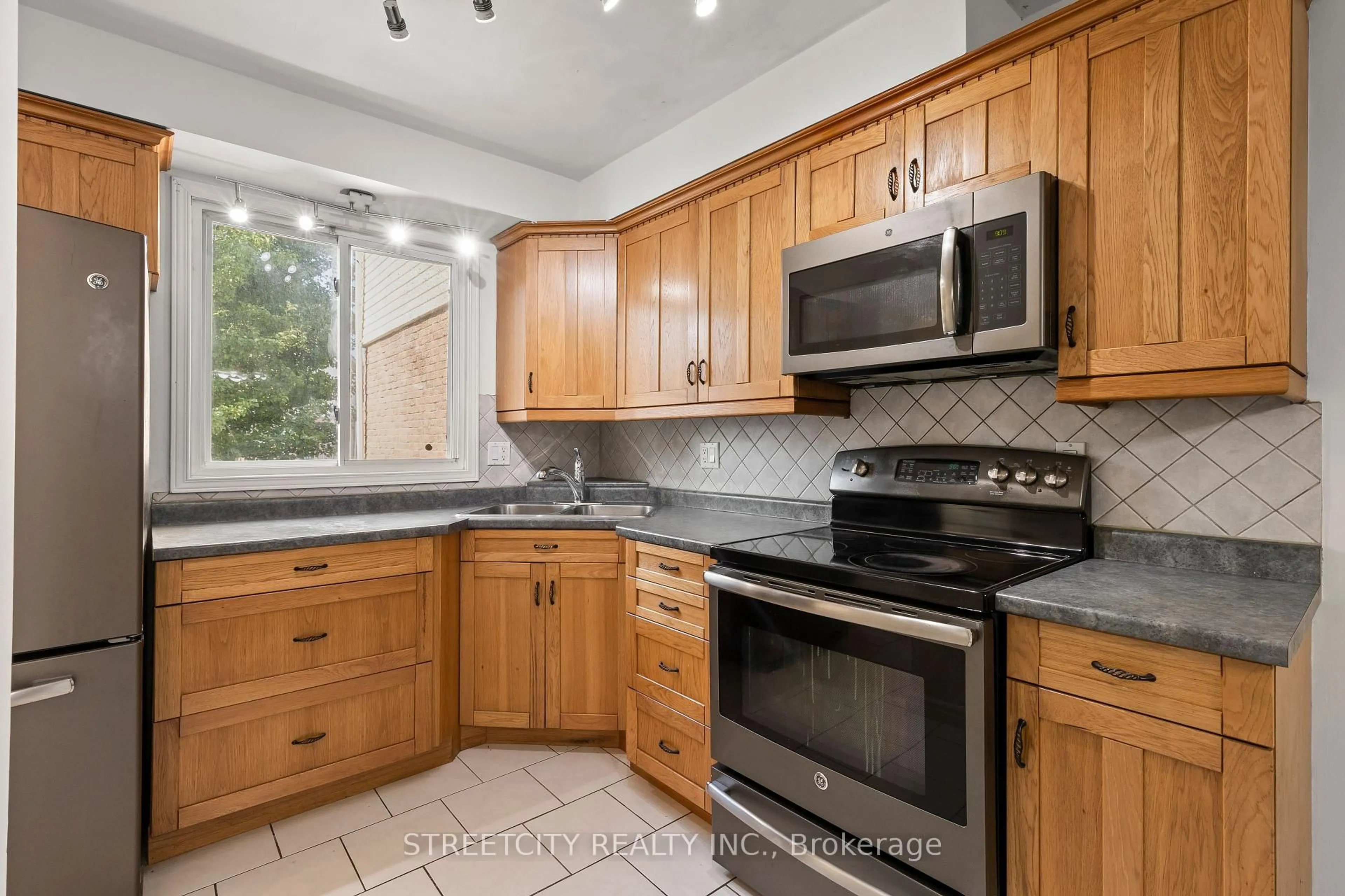 Standard kitchen, ceramic/tile floor for 230 Clarke Rd #76, London East Ontario N5W 5P5
