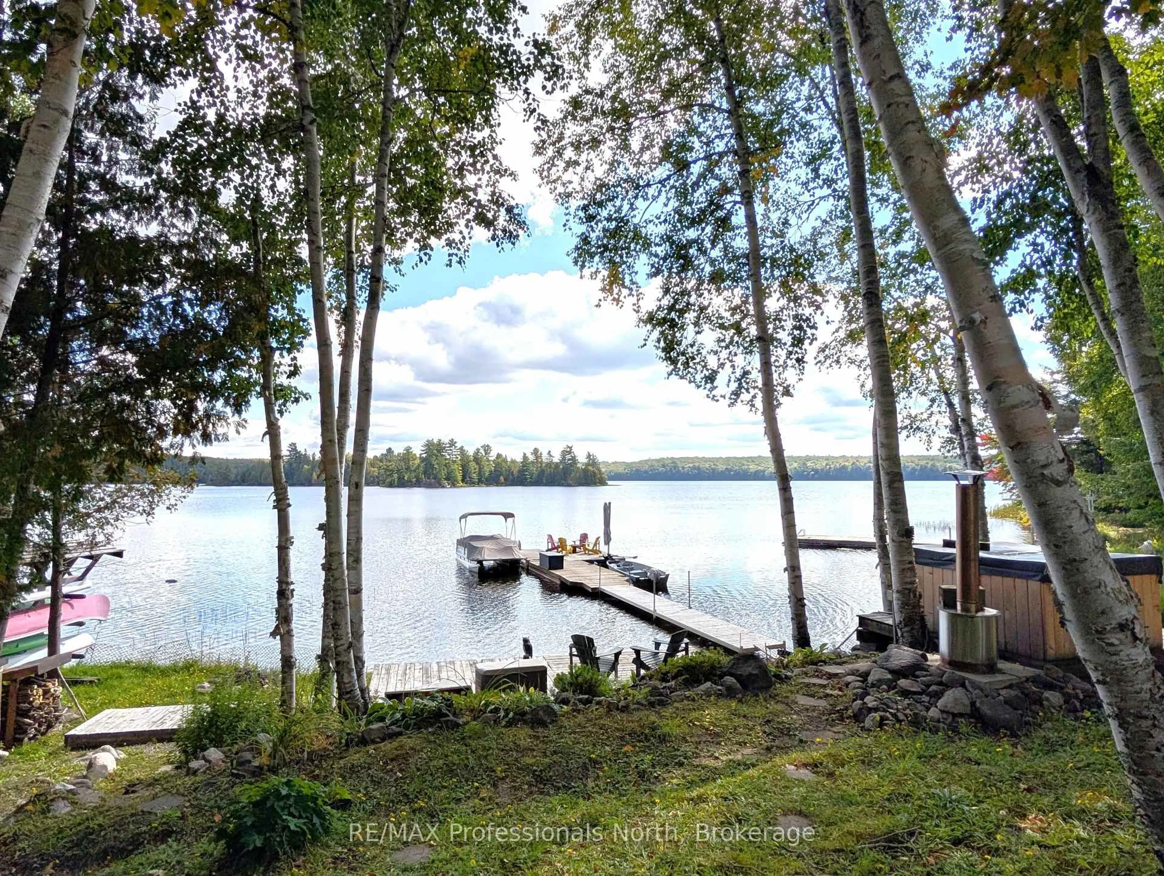 A pic from outside/outdoor area/front of a property/back of a property/a pic from drone, water/lake/river/ocean view for 1173 SPRING LAKE Rd, Parry Sound Remote Area Ontario P0A 1X0