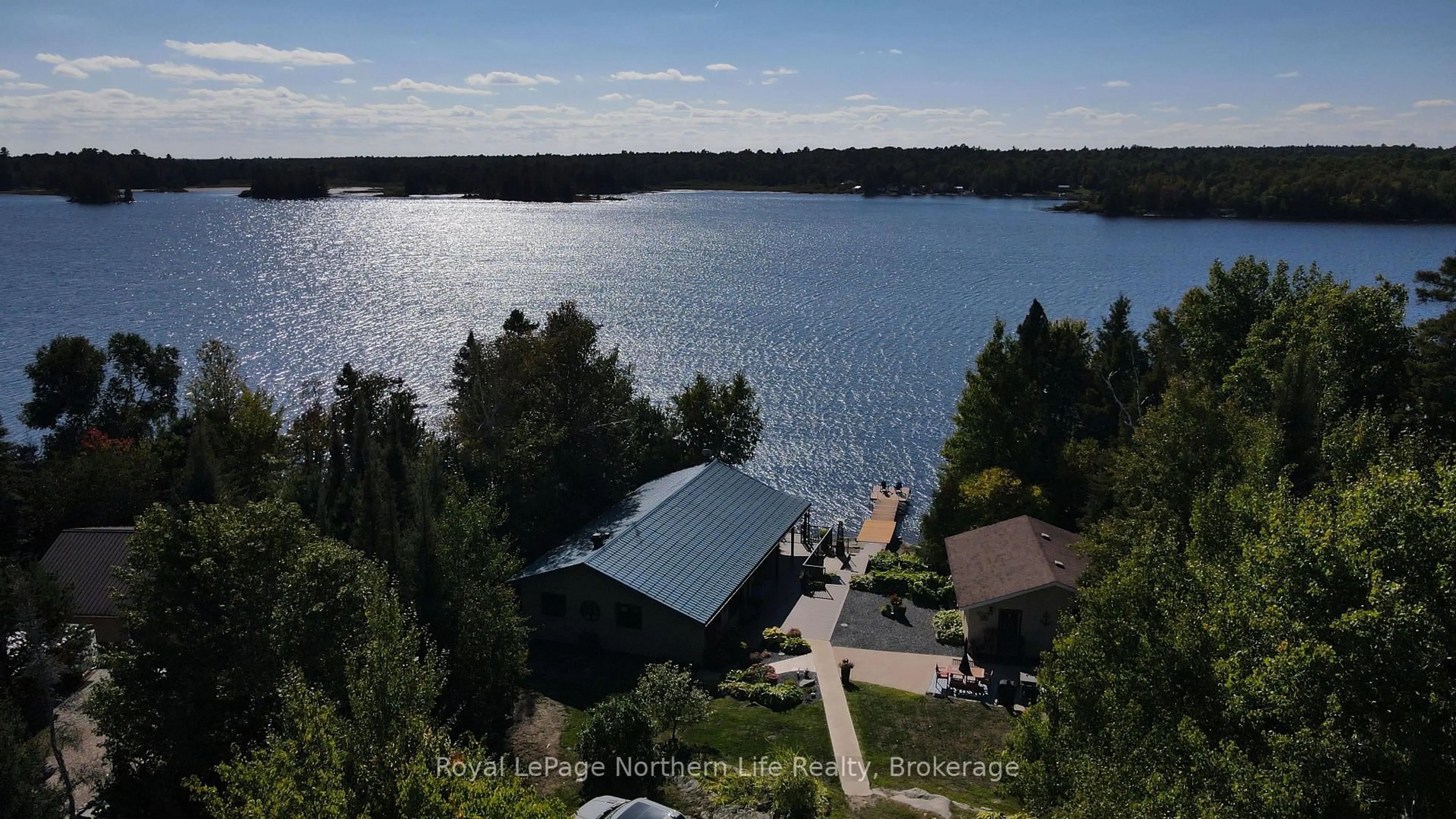 A pic from outside/outdoor area/front of a property/back of a property/a pic from drone, water/lake/river/ocean view for 233 Norland Rd, West Nipissing Ontario P0H 2M0