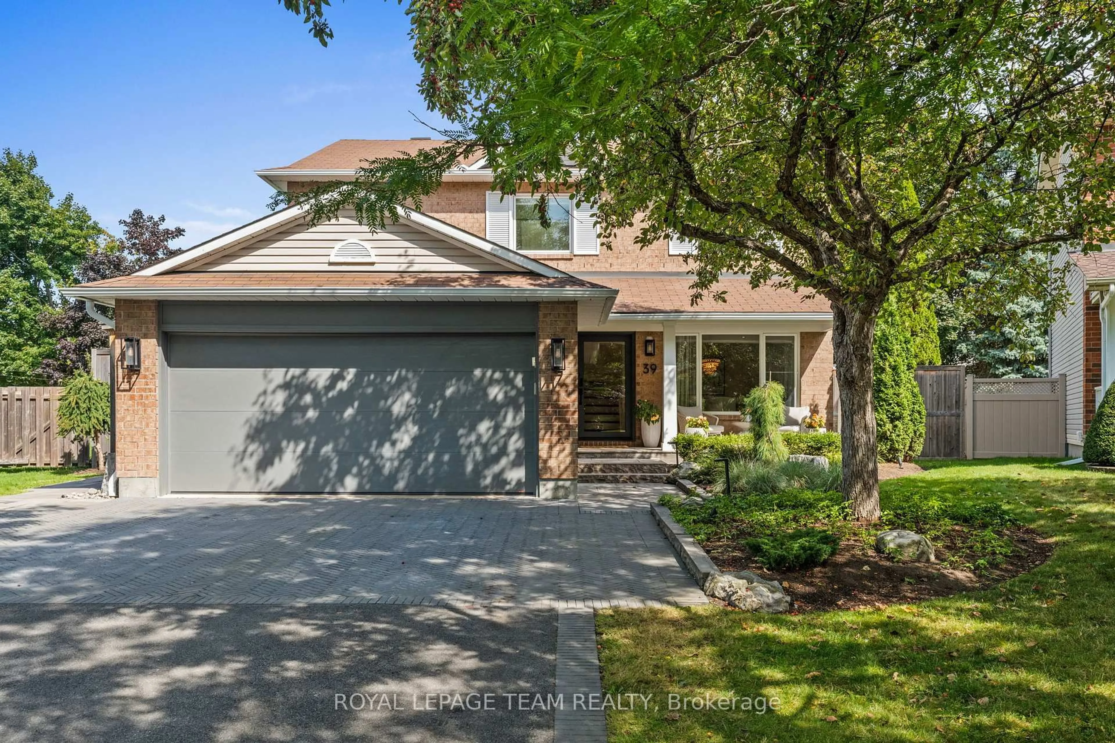 Home with brick exterior material, street for 39 Wheatland Ave, Kanata Ontario K2M 2L2