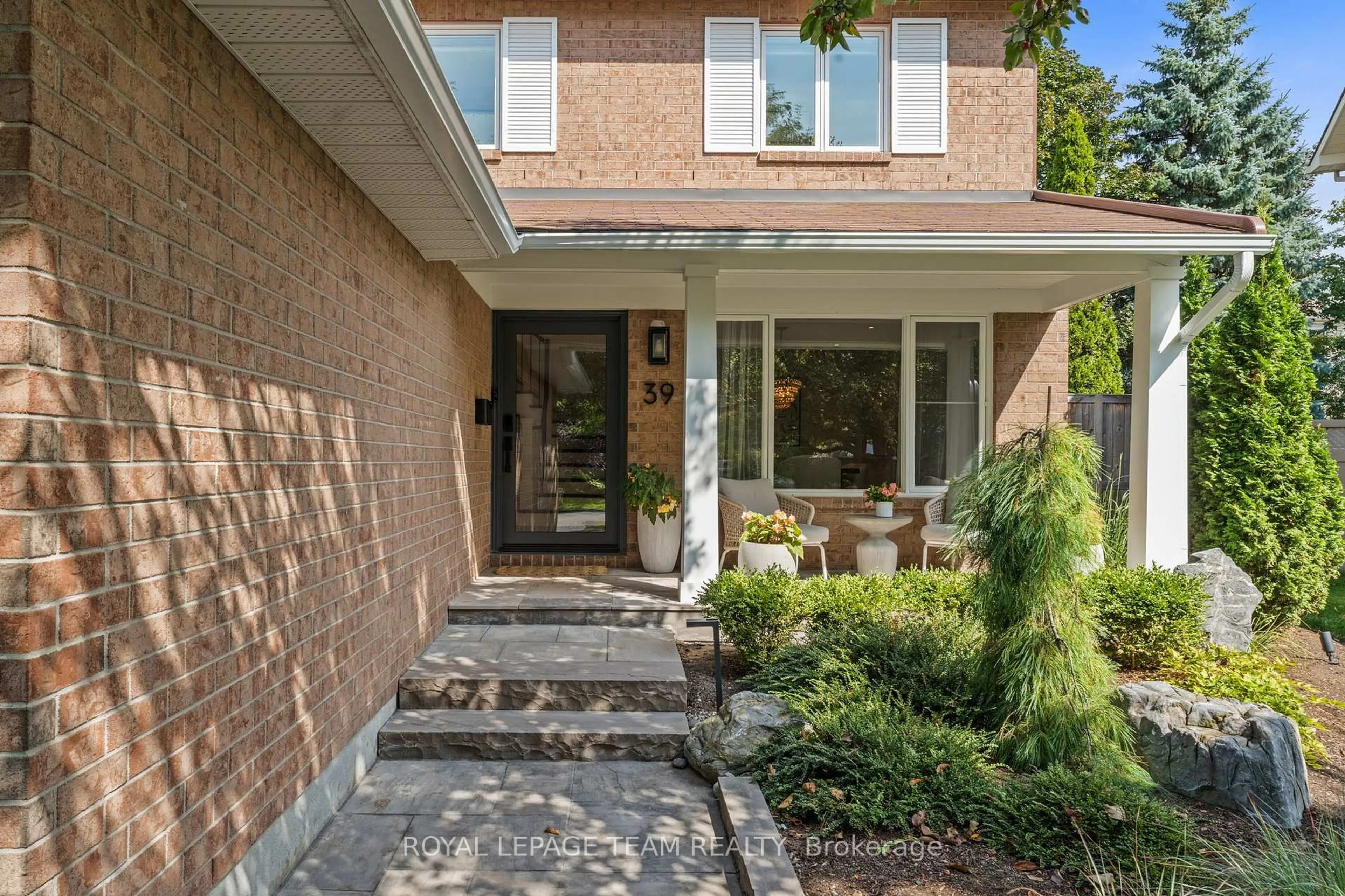 Home with brick exterior material, street for 39 Wheatland Ave, Kanata Ontario K2M 2L2