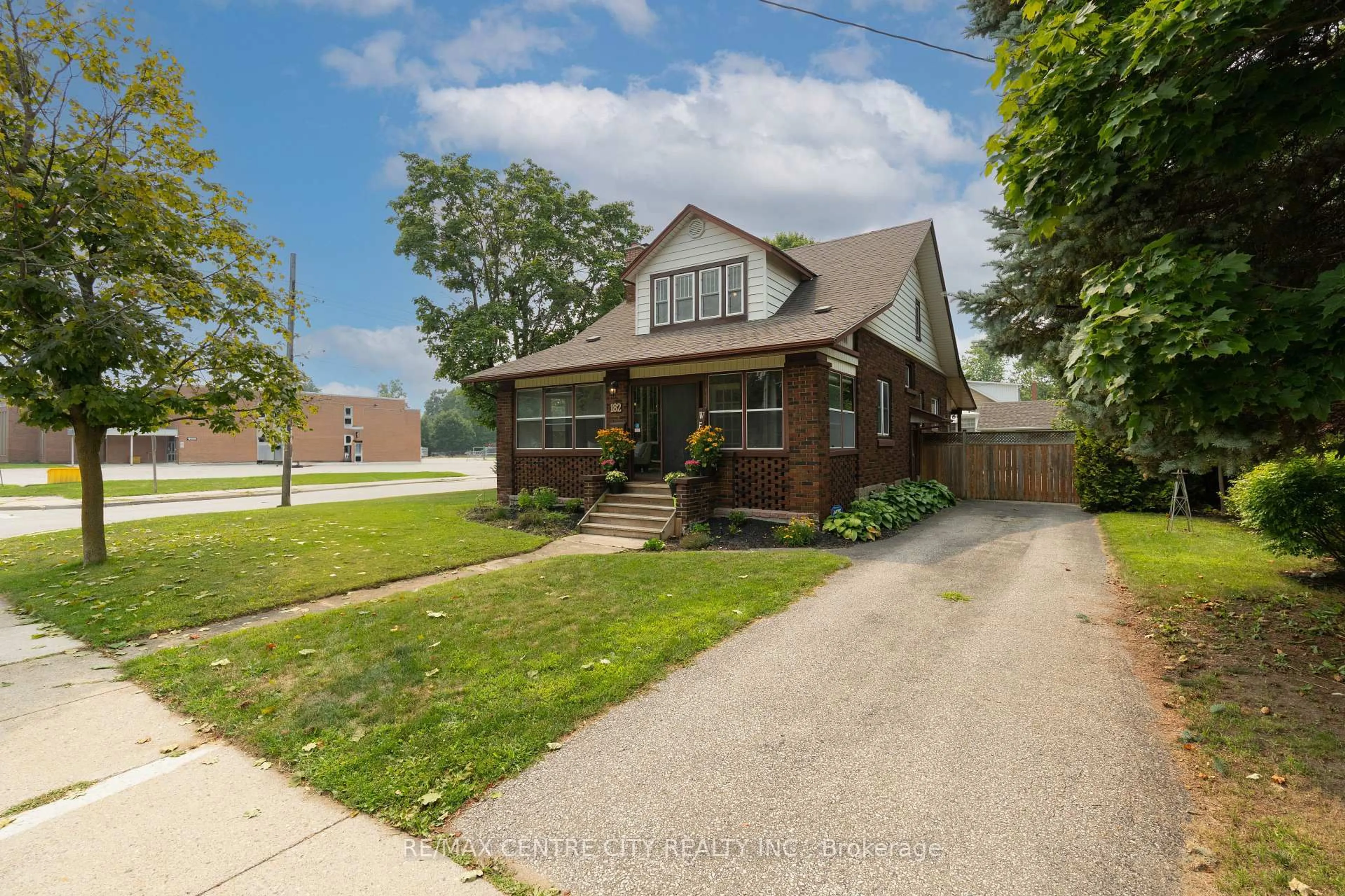 Home with brick exterior material, street for 182 John St, Aylmer Ontario N5H 2C5