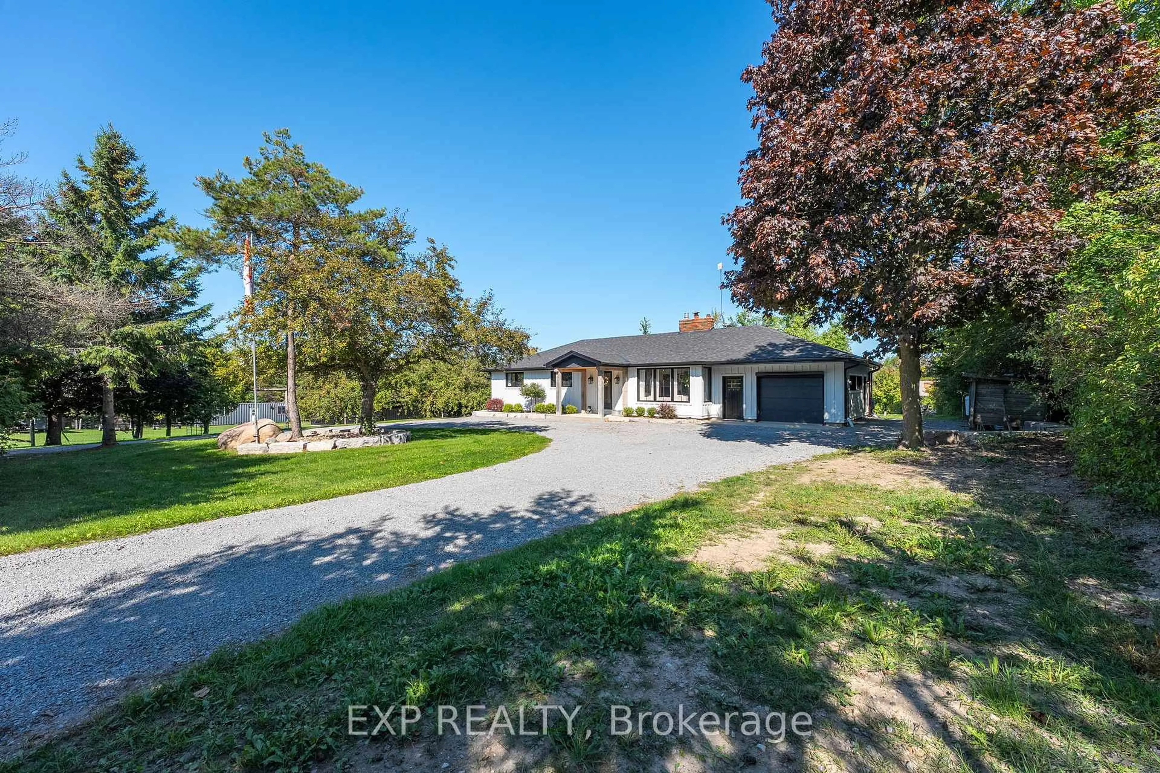 A pic from outside/outdoor area/front of a property/back of a property/a pic from drone, street for 521 Cottage Rd, Kawartha Lakes Ontario K0M 2C0