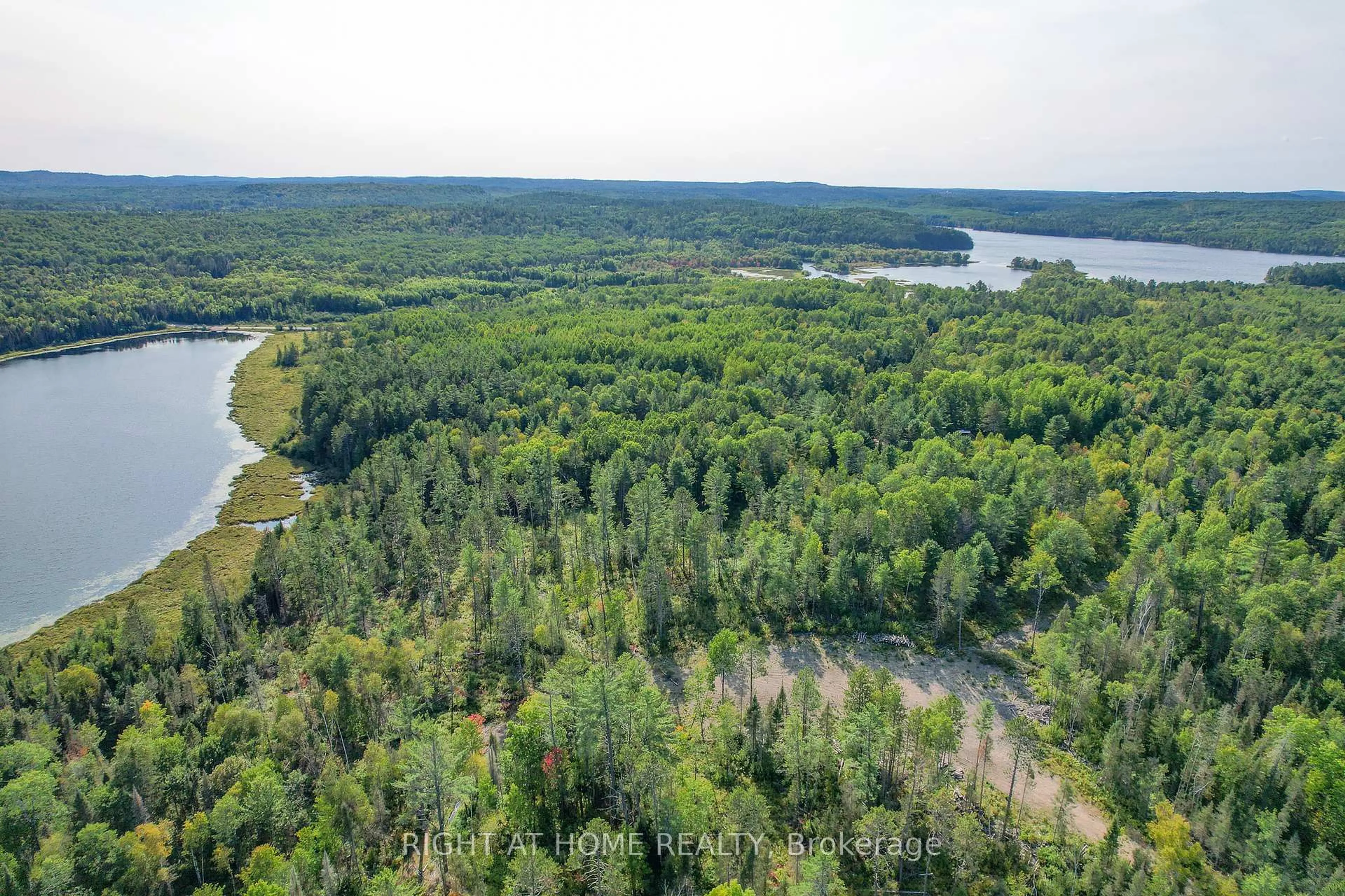 A pic from outside/outdoor area/front of a property/back of a property/a pic from drone, water/lake/river/ocean view for 618 HWY 630, Calvin Ontario P0H 1V0