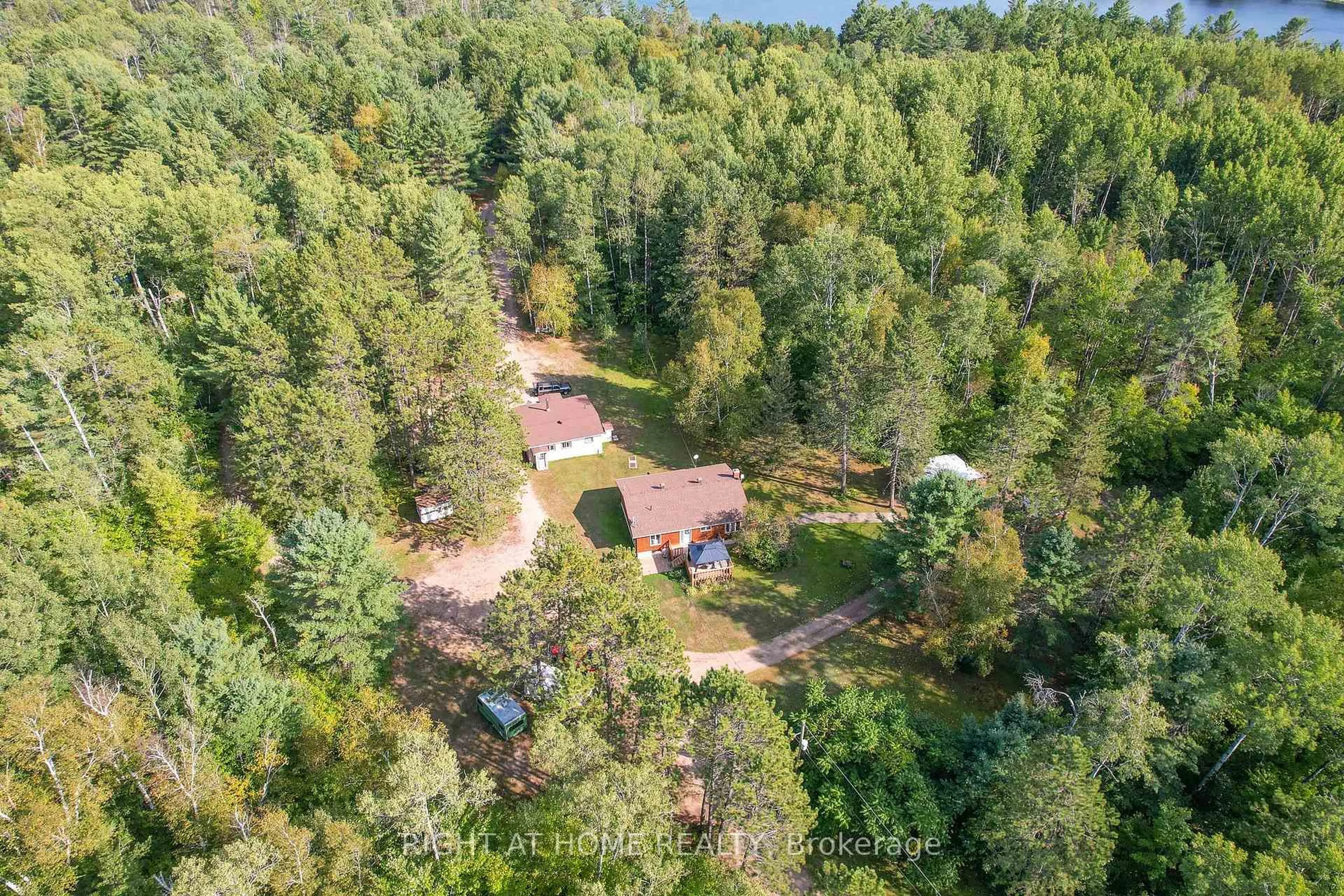 A pic from outside/outdoor area/front of a property/back of a property/a pic from drone, forest/trees view for 618 HWY 630, Calvin Ontario P0H 1V0