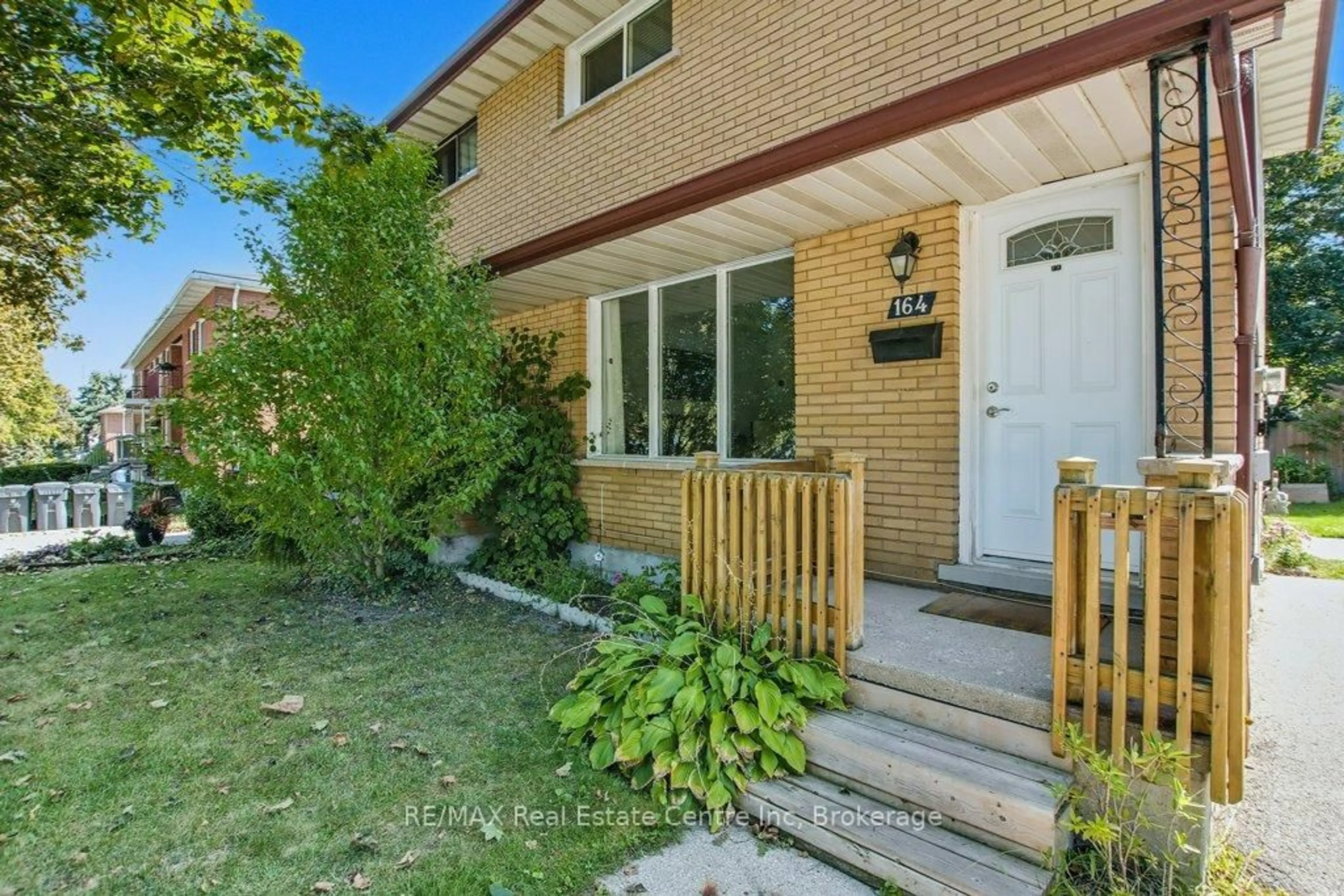 Home with brick exterior material, street for 164 Willow Rd, Guelph Ontario N1H 1W8