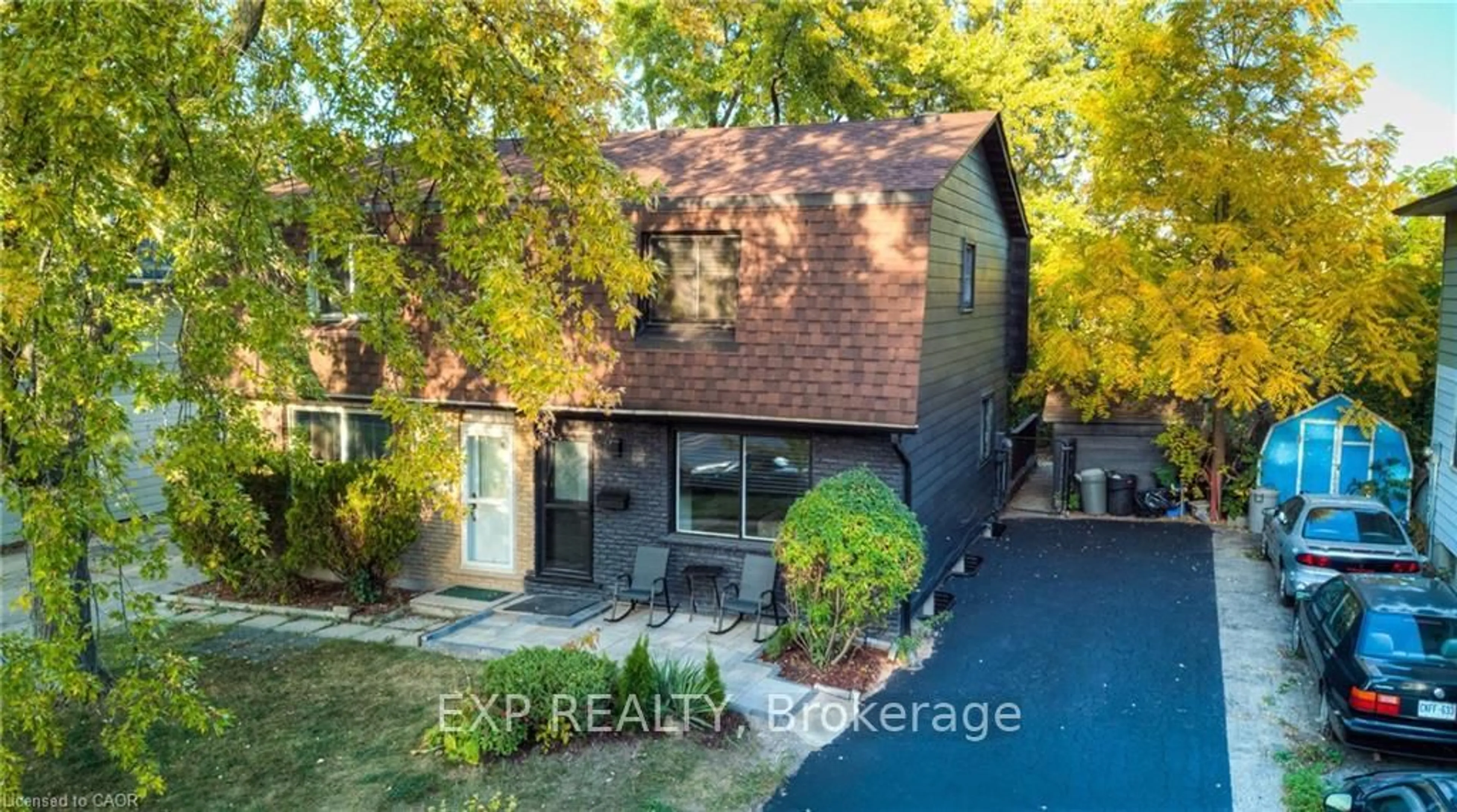 A pic from outside/outdoor area/front of a property/back of a property/a pic from drone, street for 100 Lillian Dr #B, Waterloo Ontario N2J 4J9