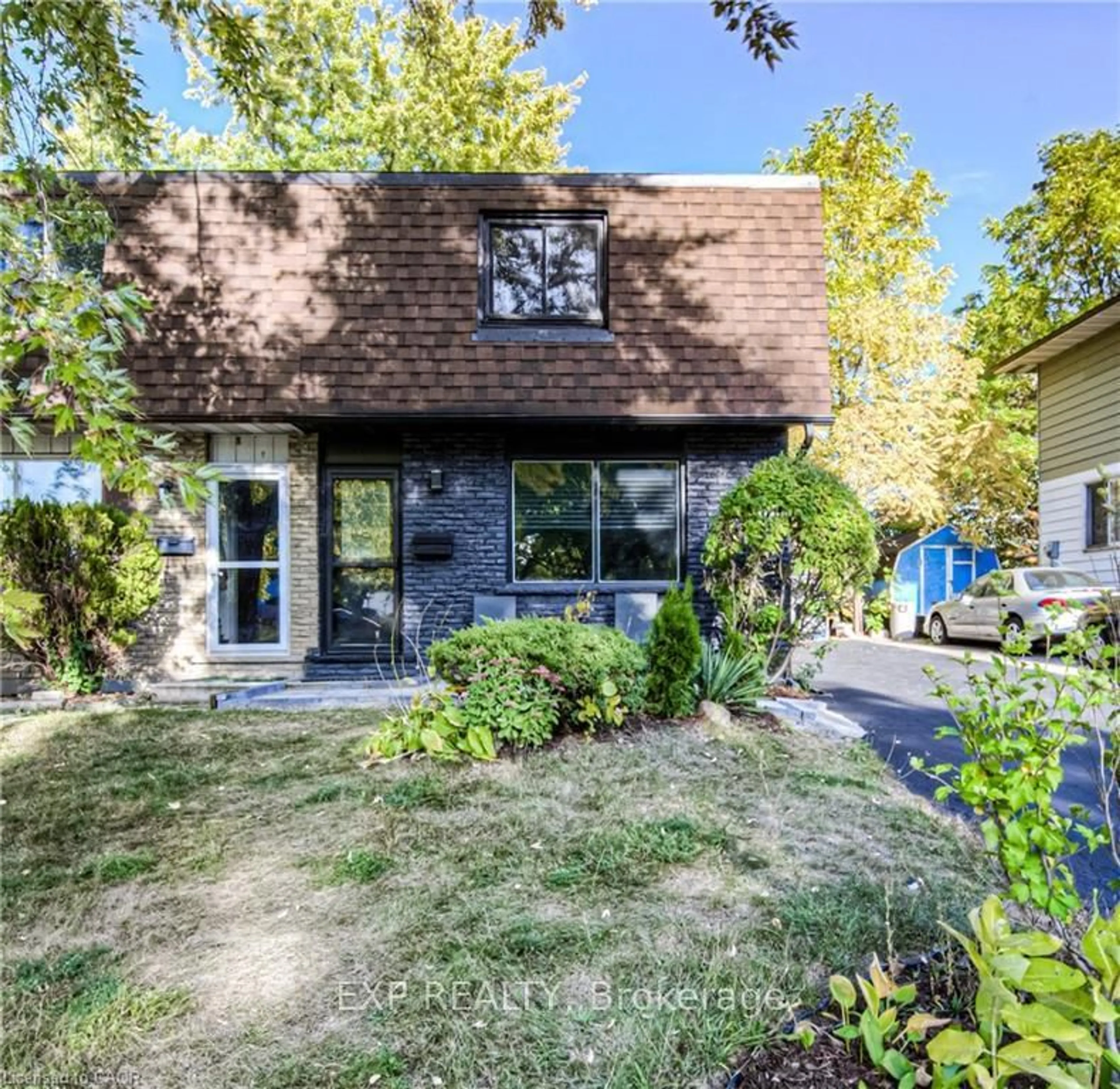Home with brick exterior material, street for 100 Lillian Dr #B, Waterloo Ontario N2J 4J9