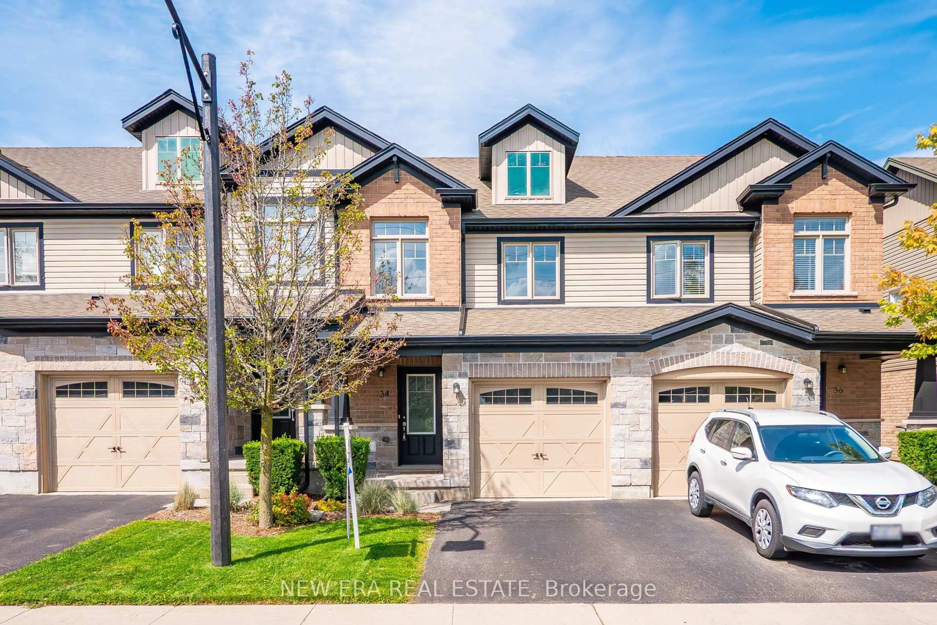 Home with brick exterior material, street for 34 Arlington Cres, Guelph Ontario N1L 0L1