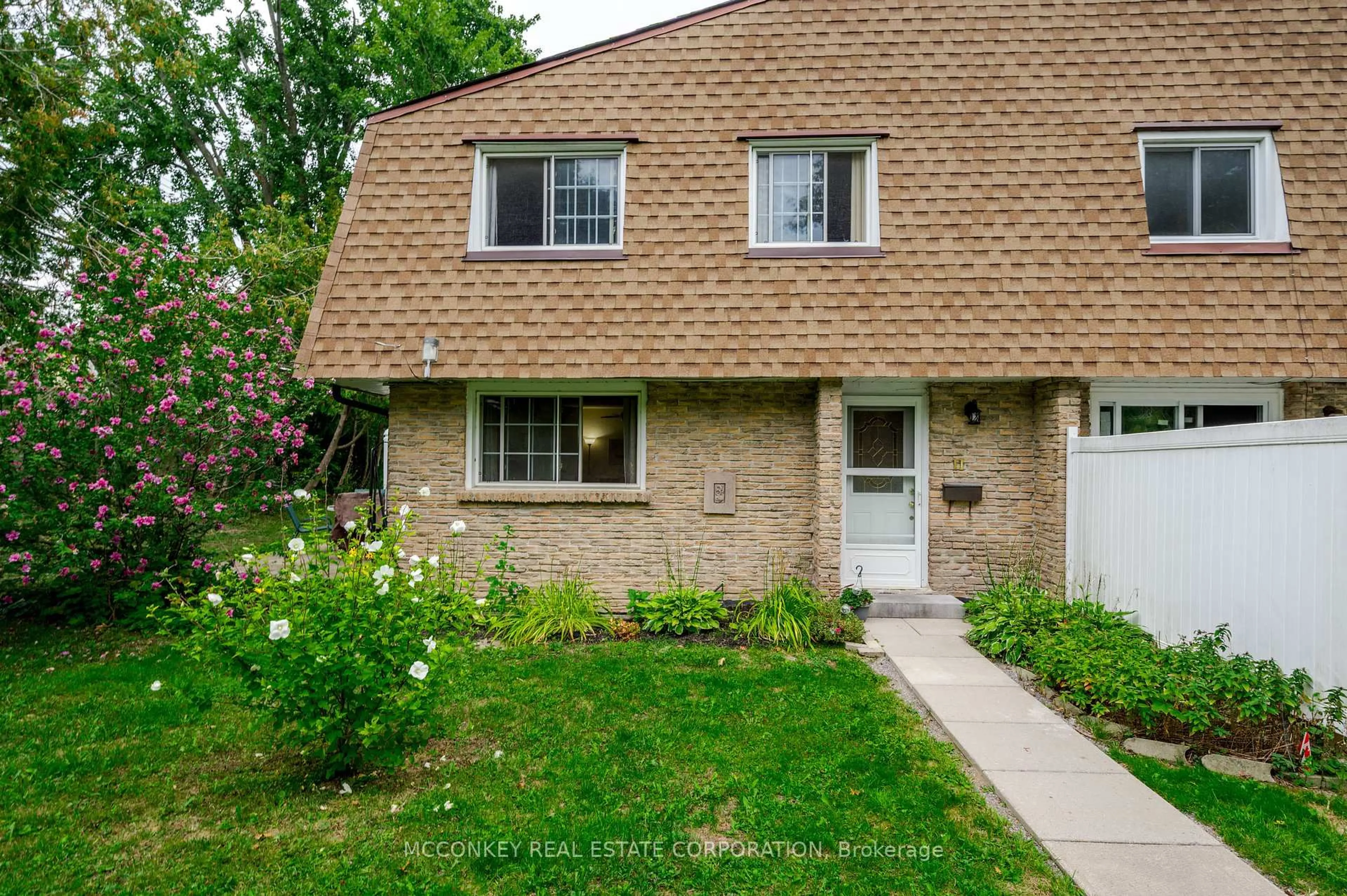 Home with vinyl exterior material, street for 740 Chamberlain St #11, Peterborough Ontario K9J 4M3