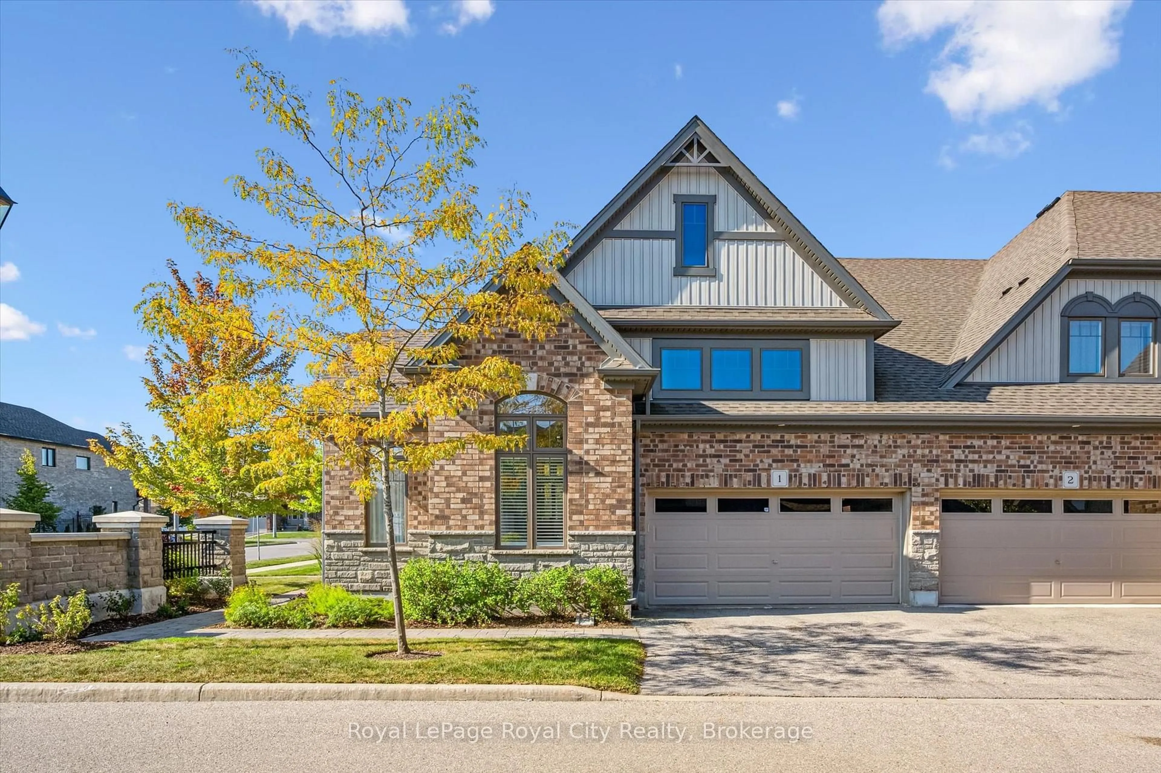 Home with brick exterior material, street for 39 Kay Cres #1, Guelph Ontario N1L 0N5
