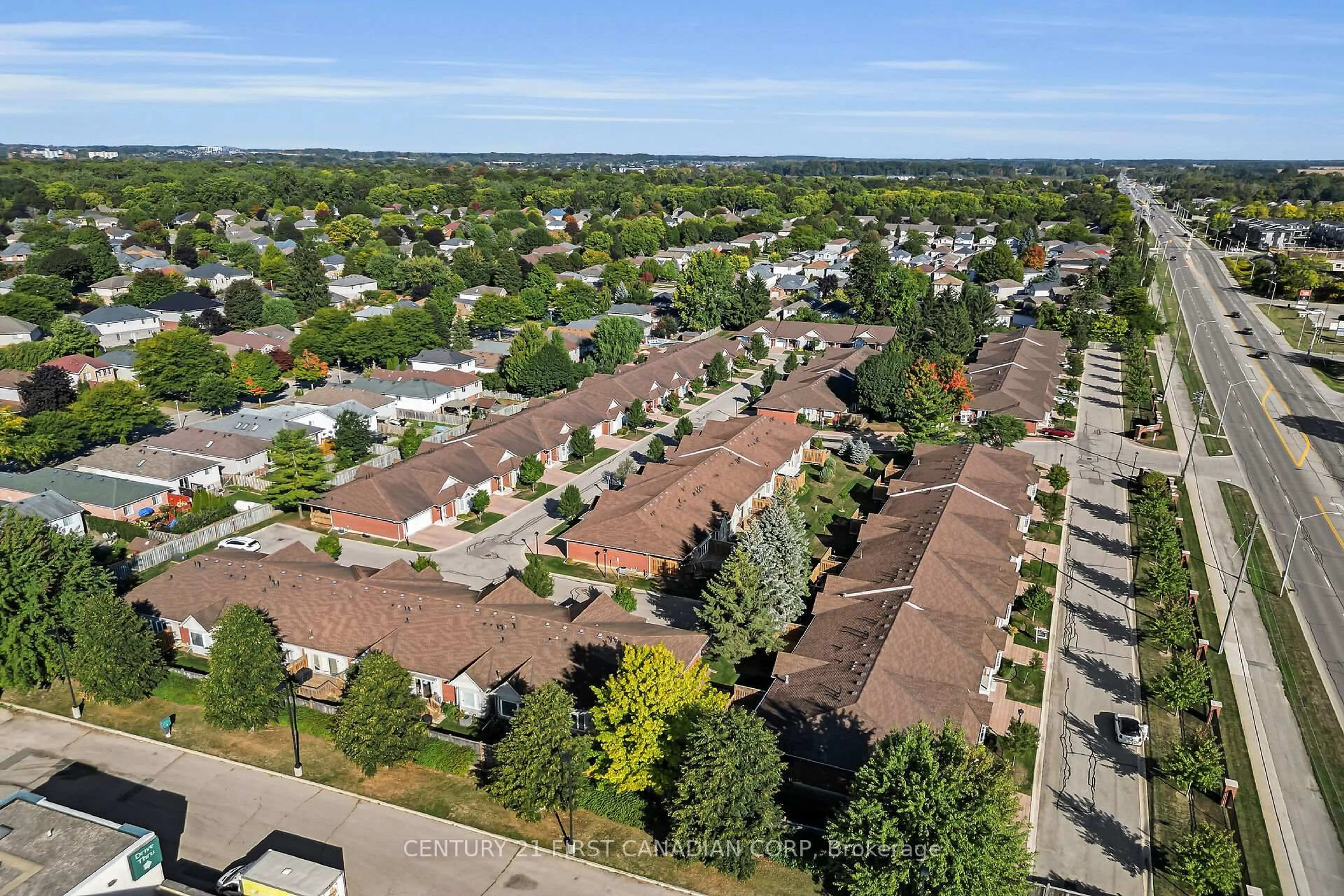 A pic from outside/outdoor area/front of a property/back of a property/a pic from drone, unknown for 1555 Highbury Ave #45, London East Ontario N5Y 5R3